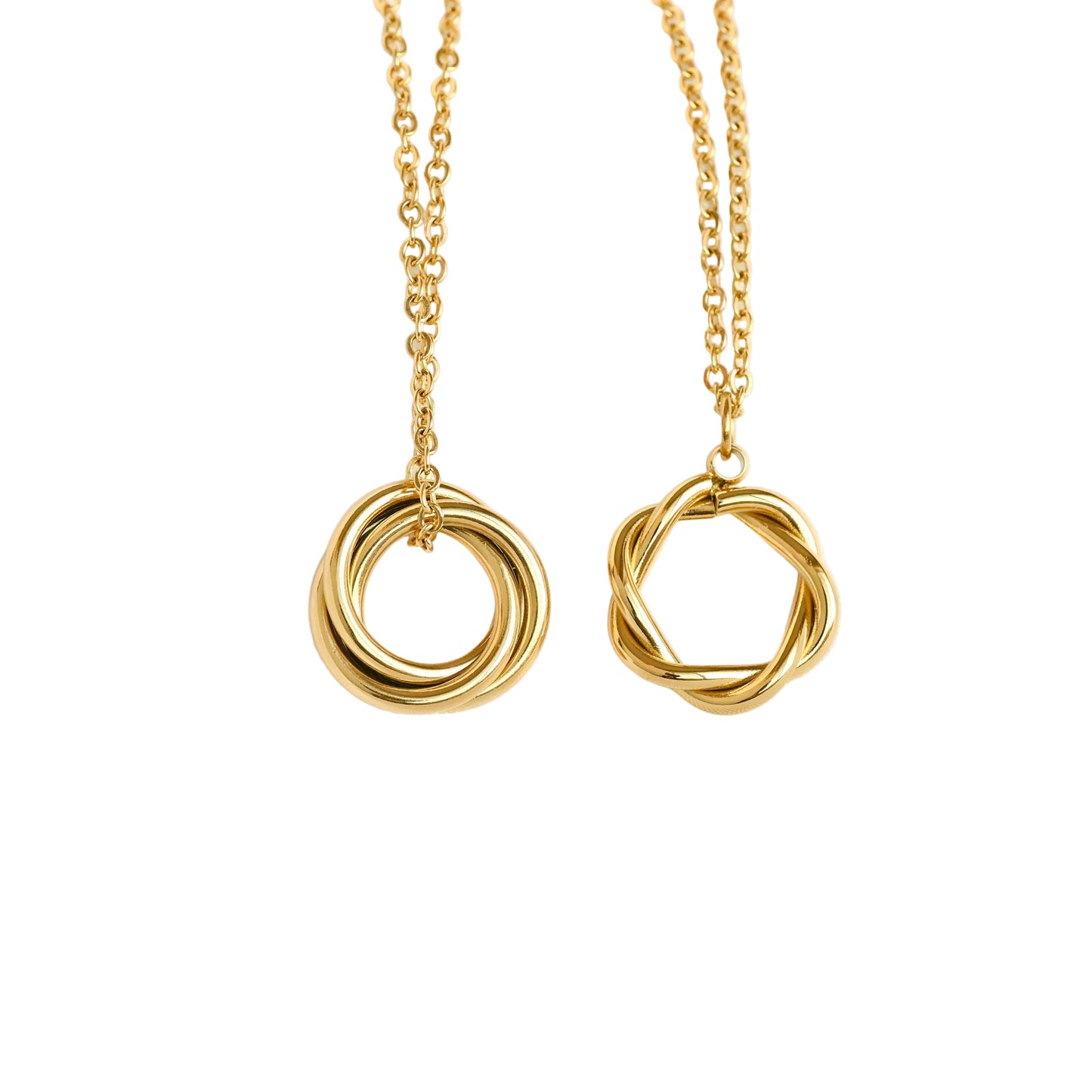Two gold necklaces with interlocking circular pendants on a white background