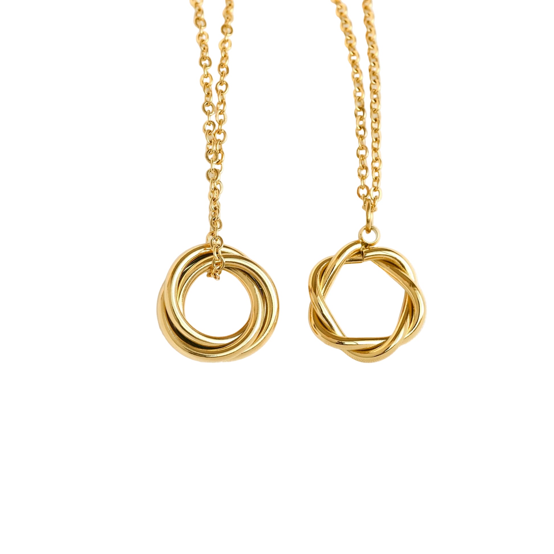 Two gold necklaces with interlocking circular pendants on a white background