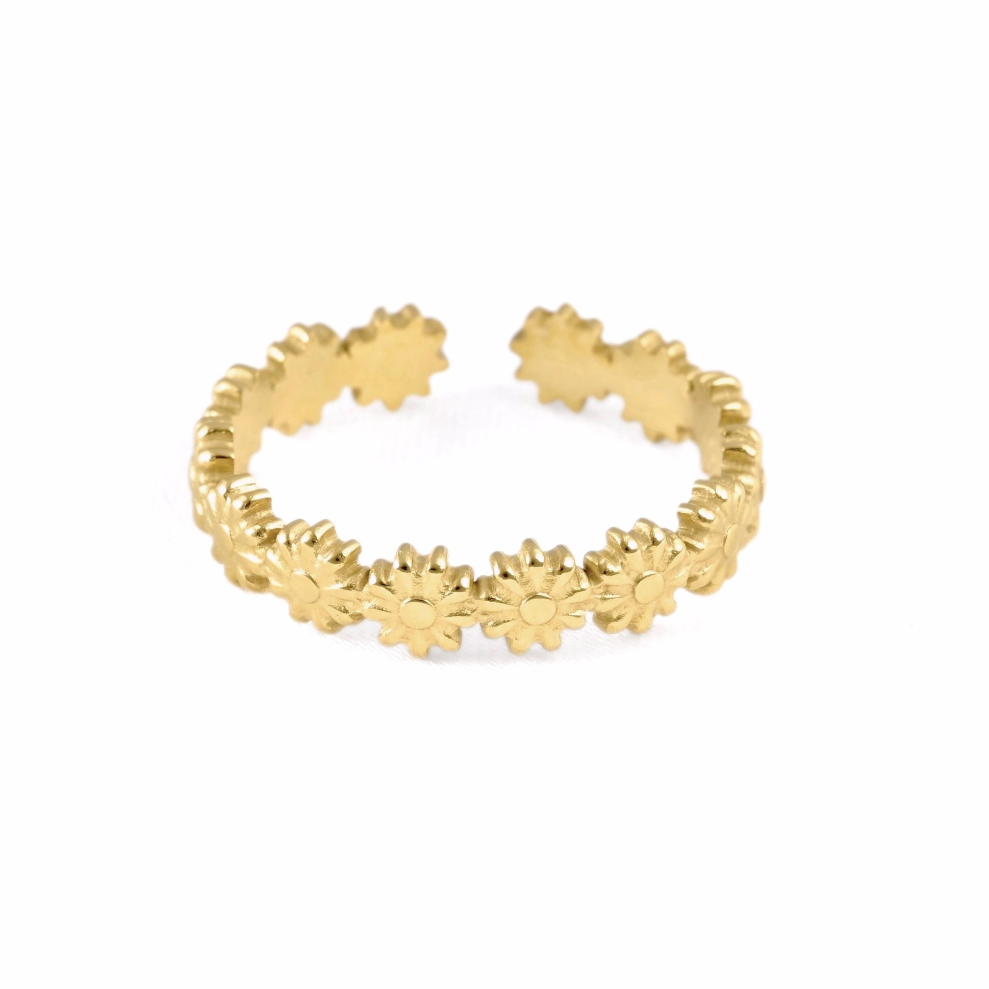 A gold open cuff ring featuring a continuous row of small daisy-shaped links, shown on a plain white background.