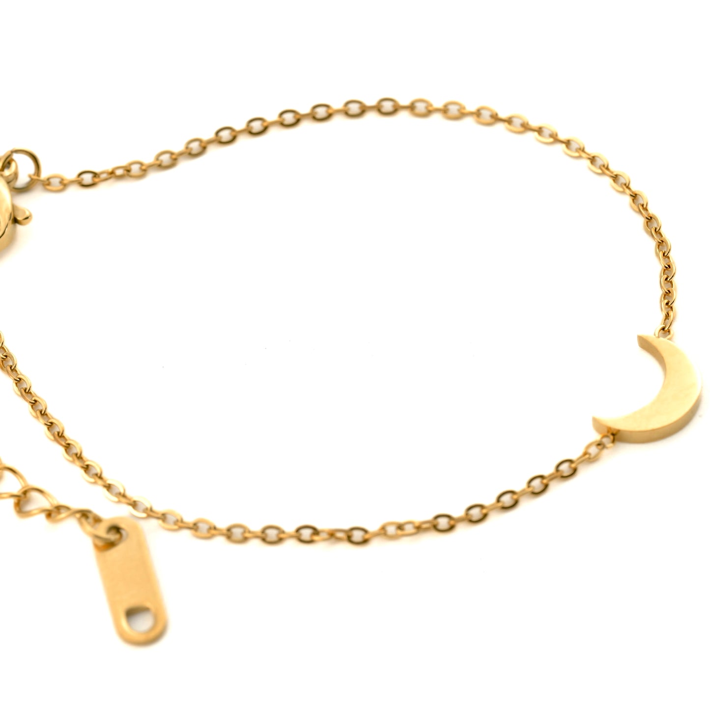 Gold bracelet with a crescent moon charm on a white background