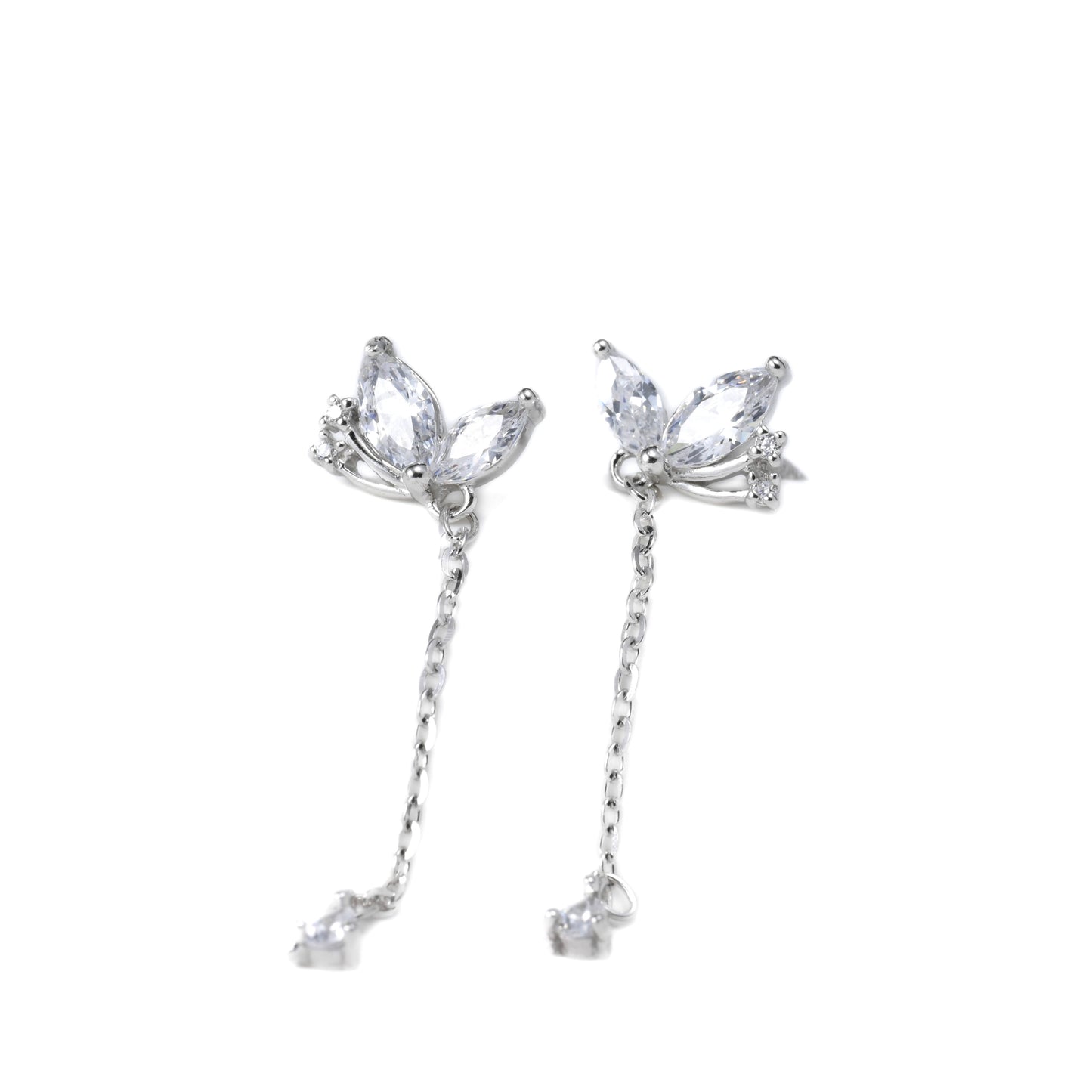 Pair of silver marquise earrings with clear gemstones on a white background