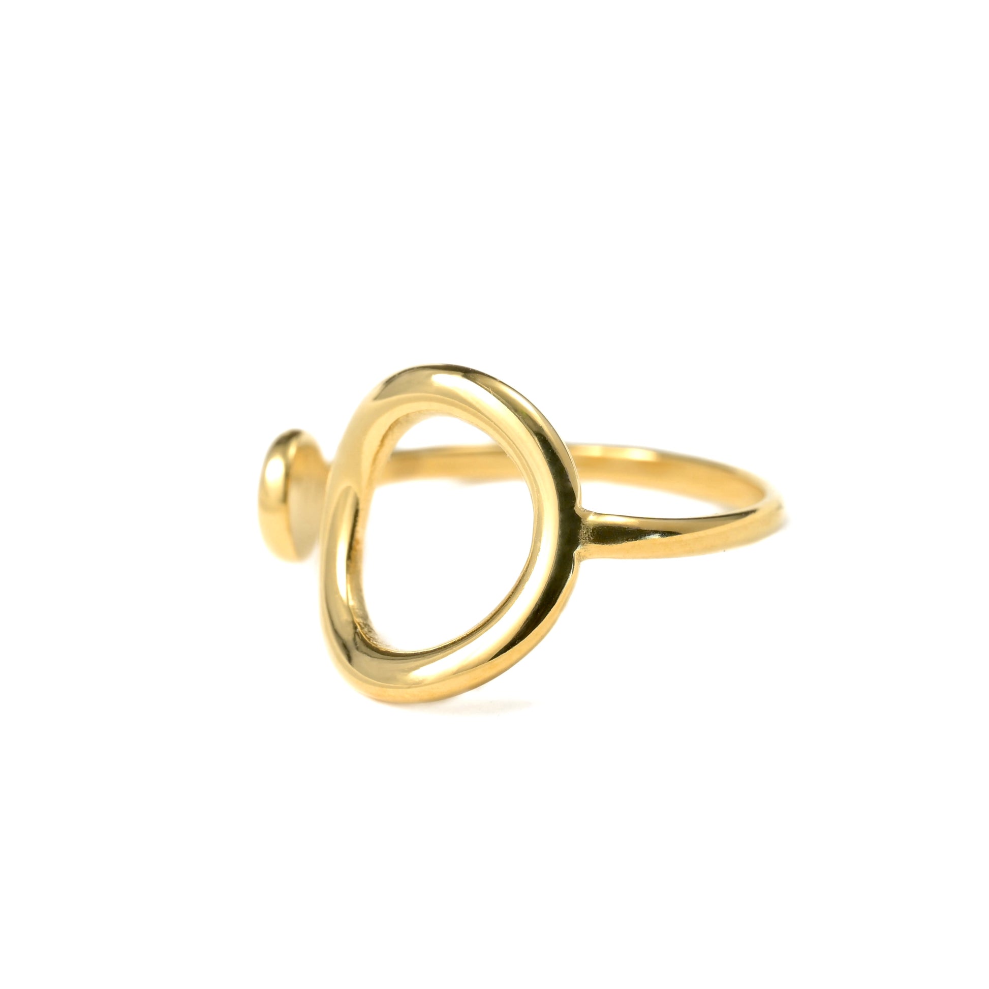 Gold ring with a unique design on a white background