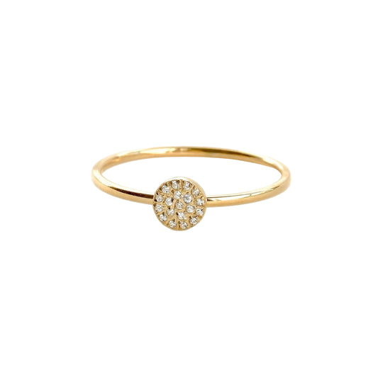 Front view of slim gold ring with a pave CZ disc in front on a white background