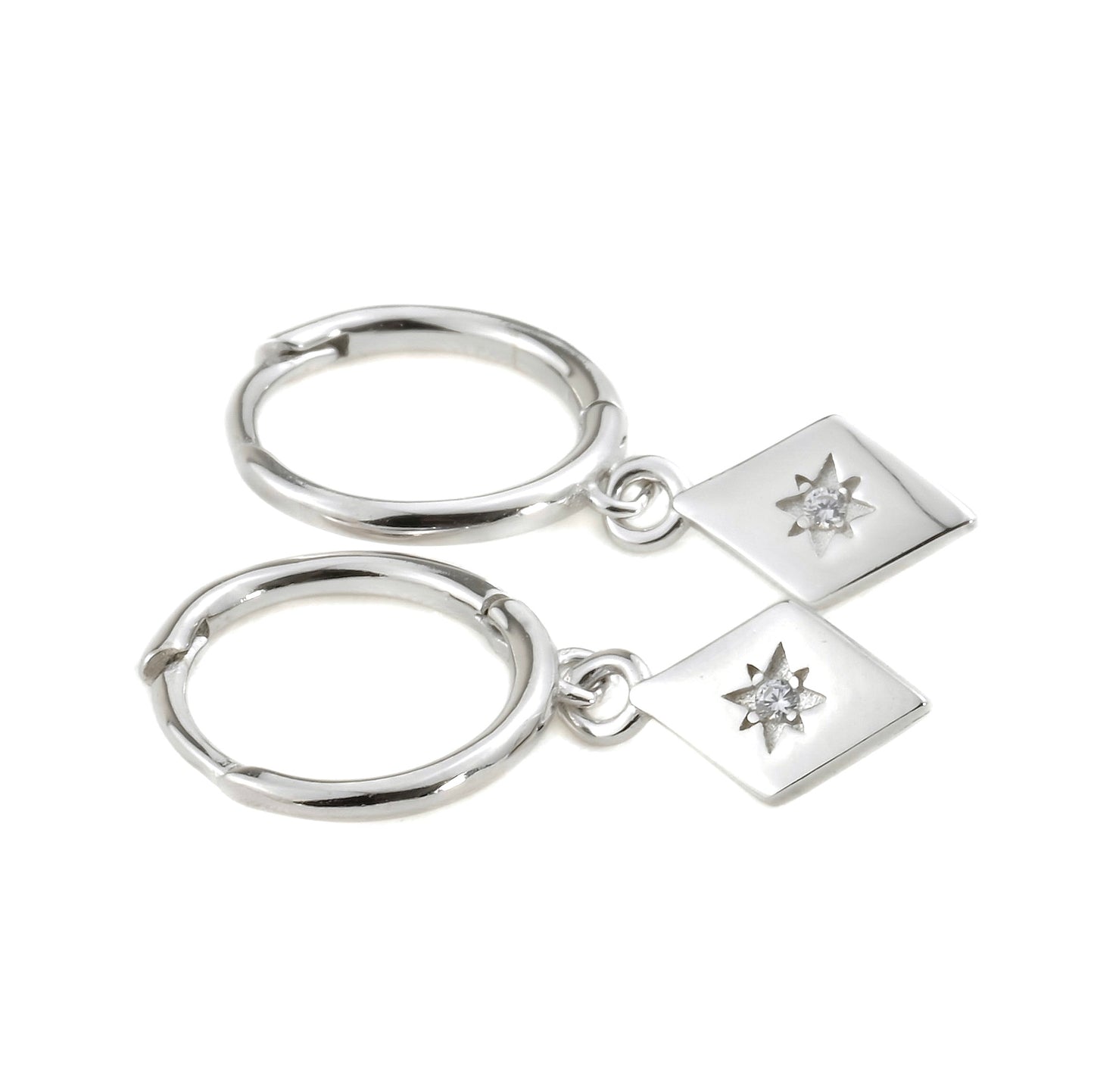 Silver earrings with diamond-shaped charms on a white background
