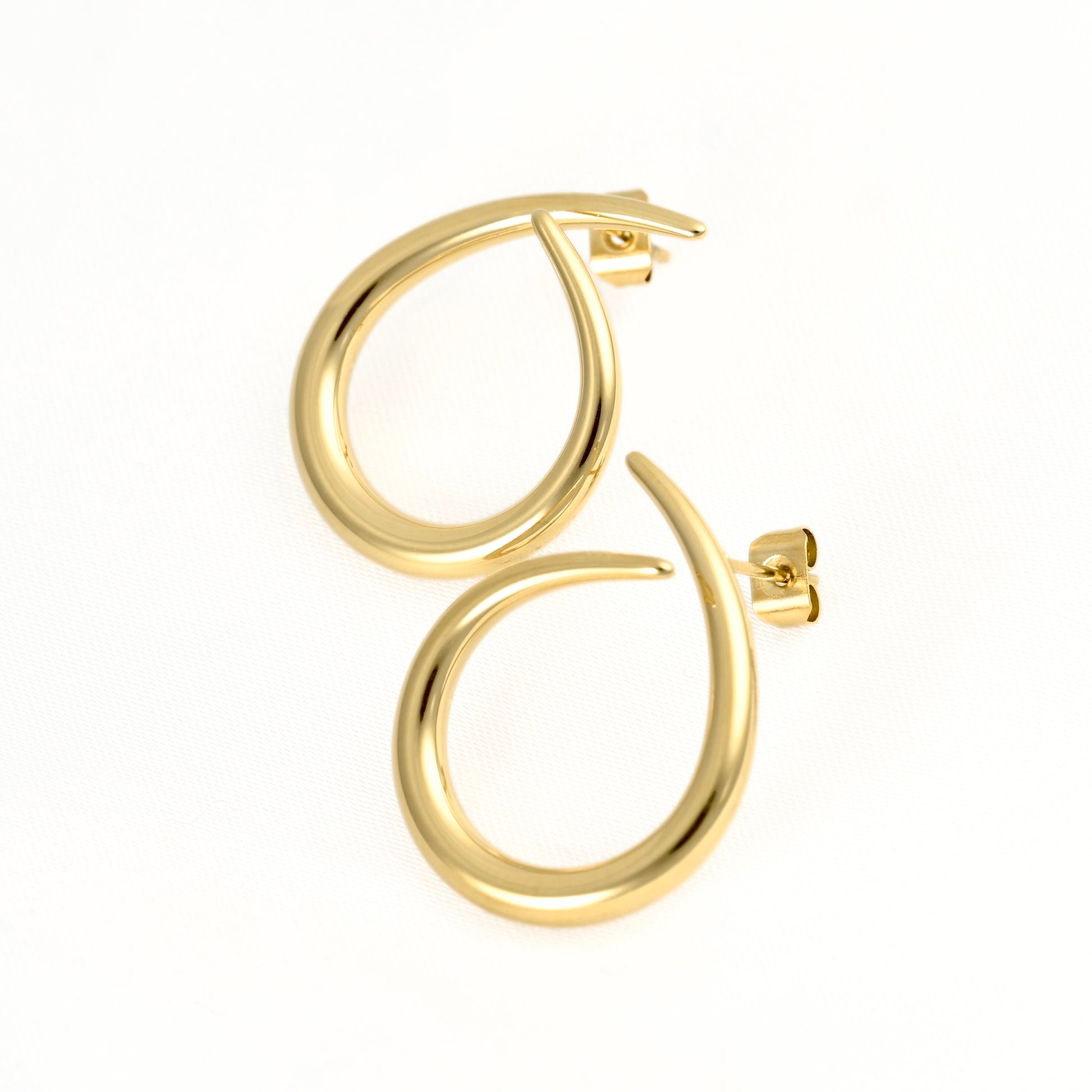 A pair of polished gold hoop drop earrings with post-back closures, displayed on a clean white background.