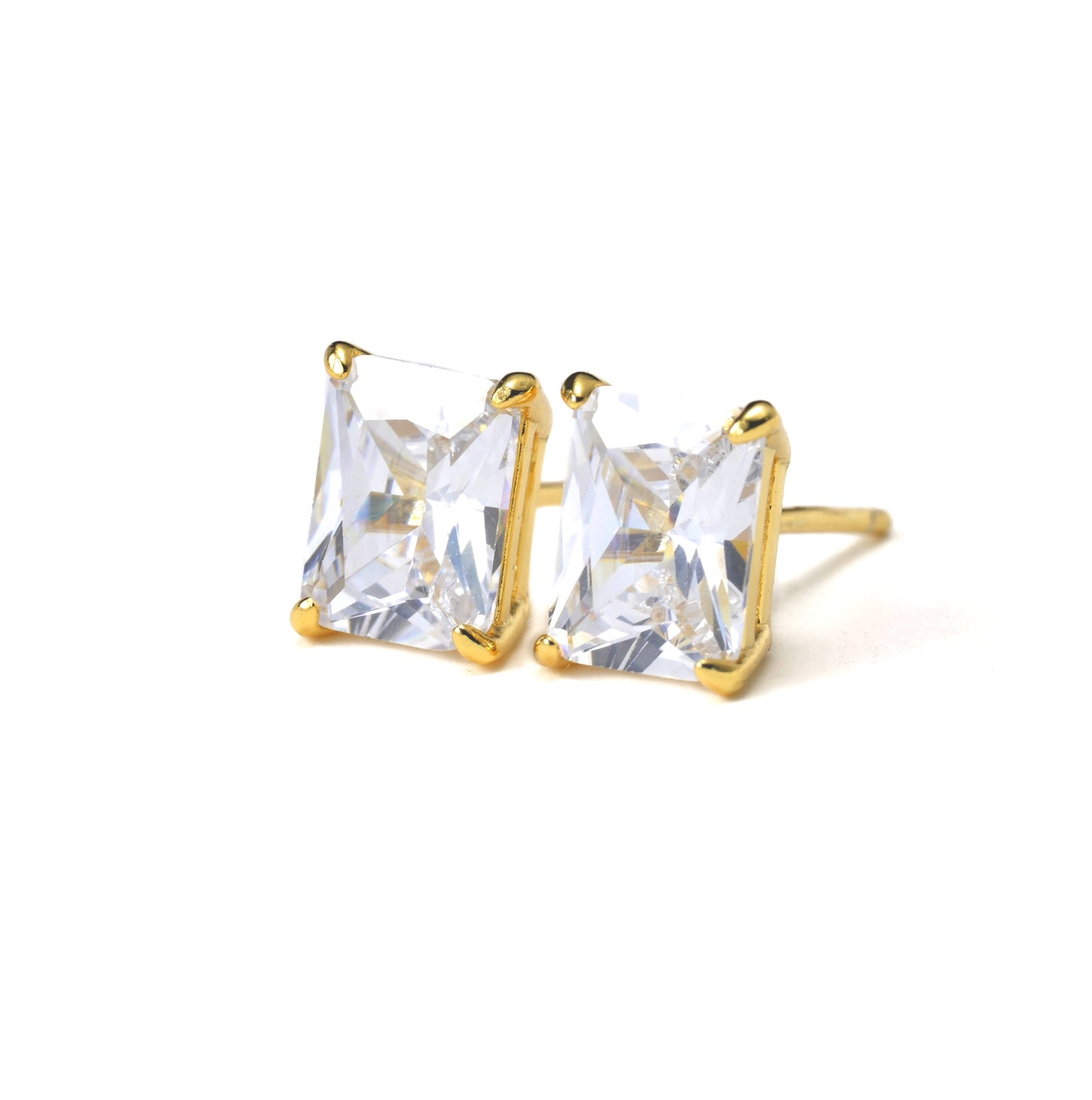 Gold rectangular diamond stud earrings with clear gemstones on a white background