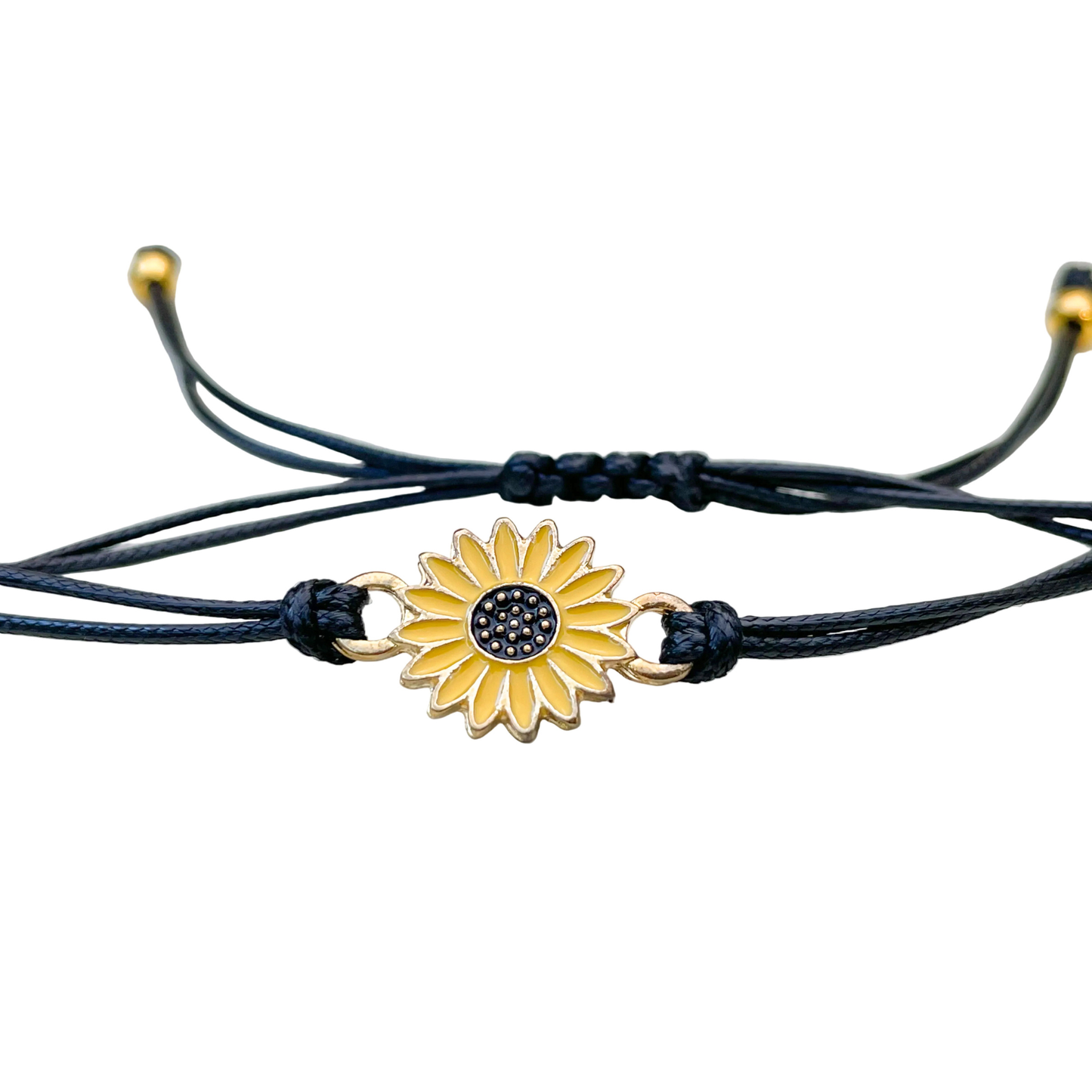 Close-up front view of bracelet with sunflower charm on a white background