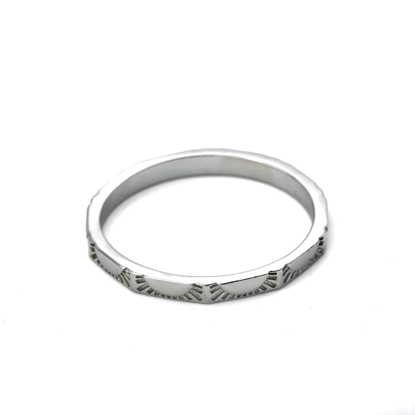 Thin Silver celestial band with sun design on a white background