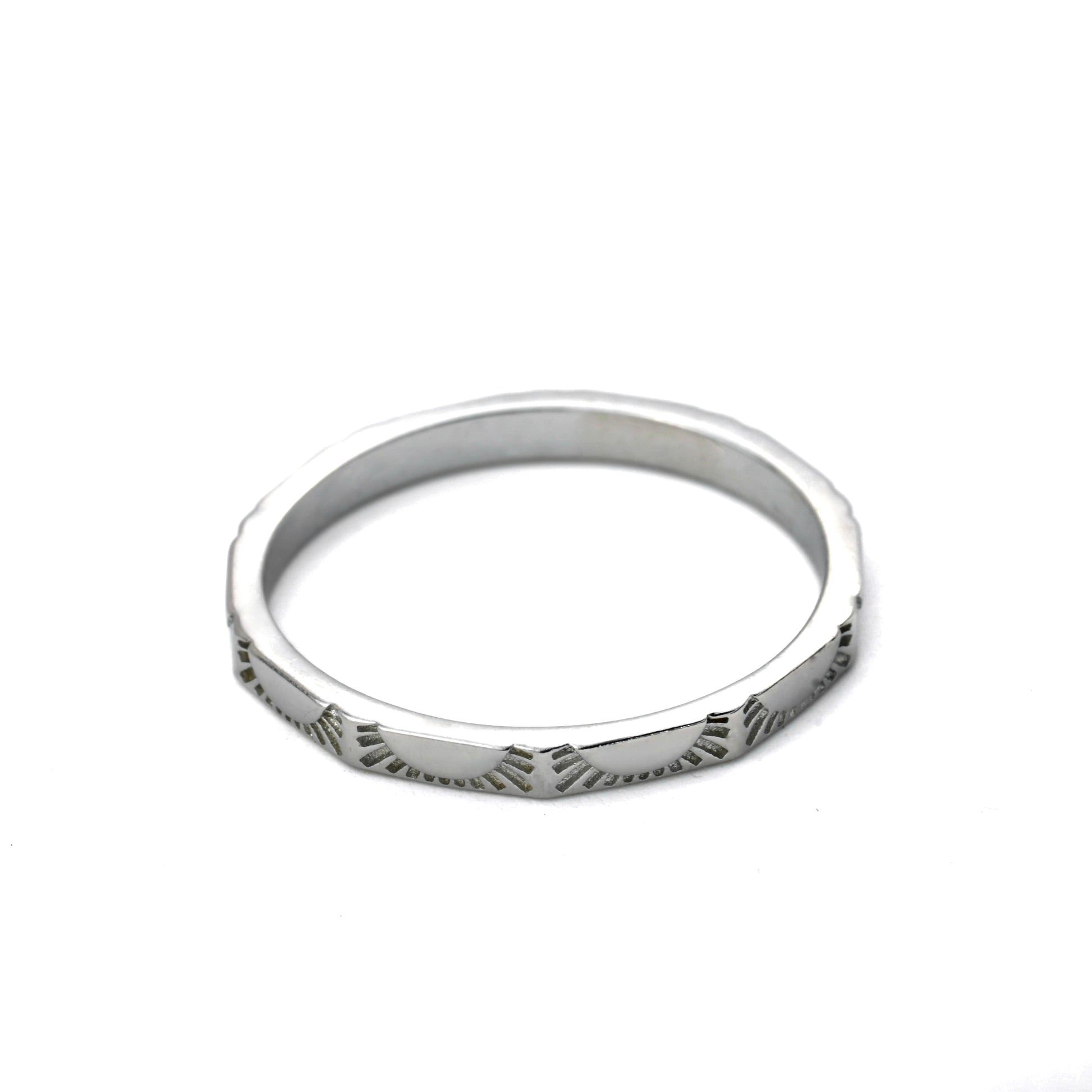 Thin Silver celestial band with sun design on a white background