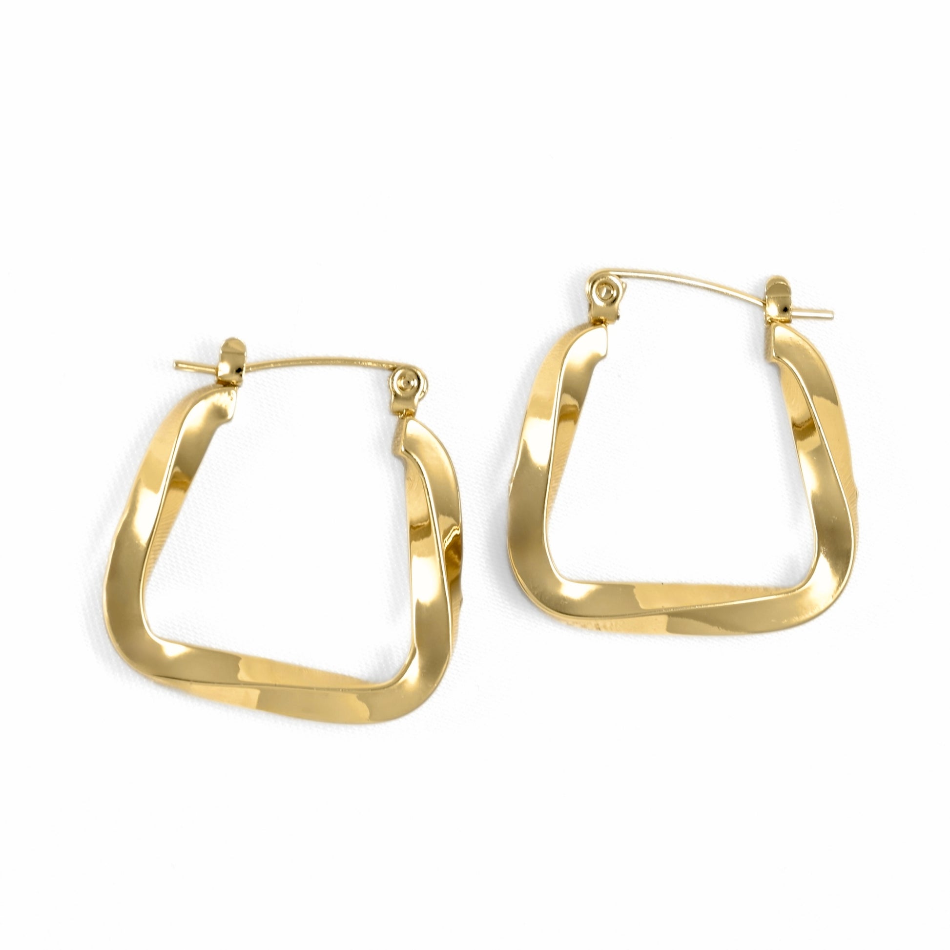 A pair of gold-toned geometric hoop earrings with a polished, hammered finish, displayed on a clean white background.