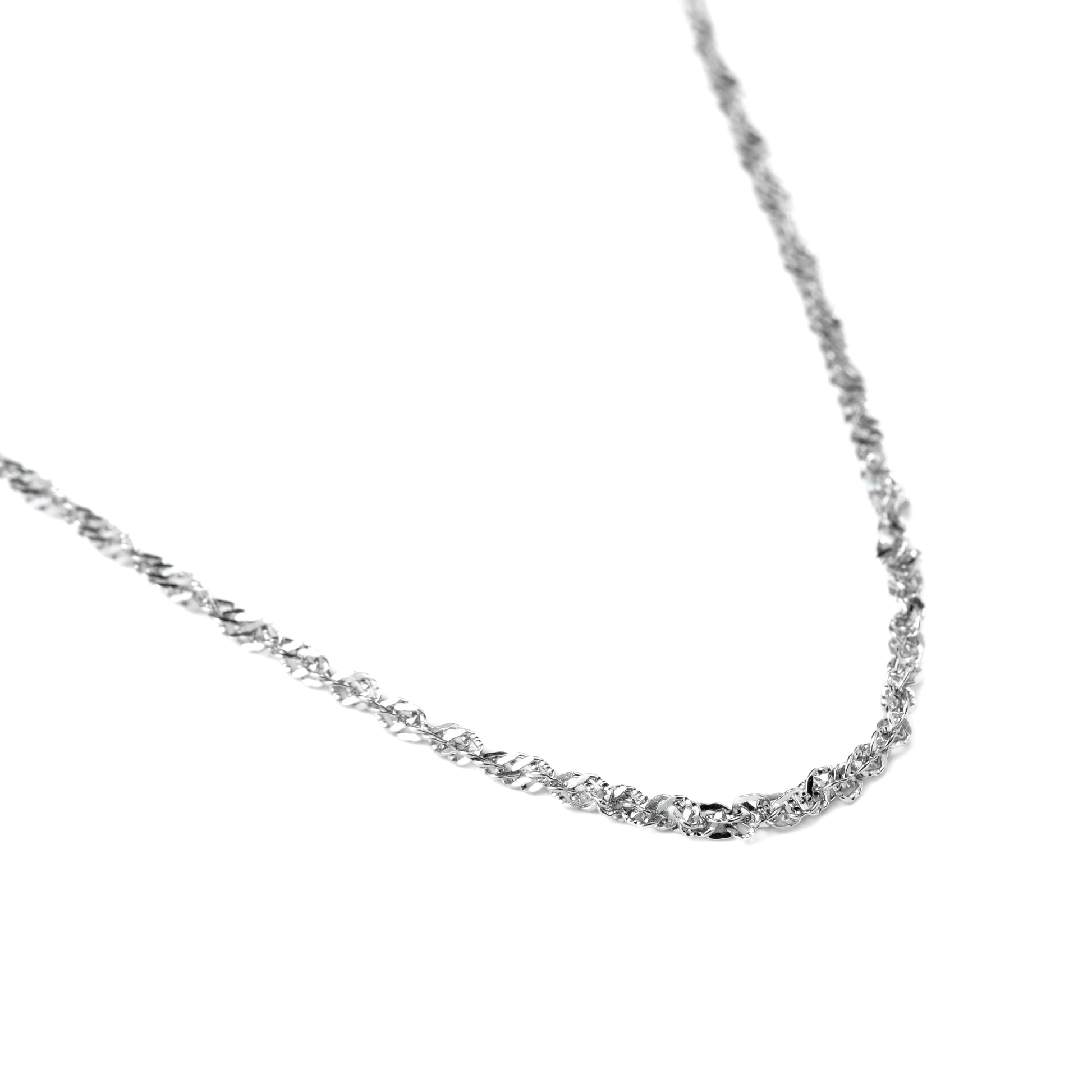 Silver chain necklace on a white background