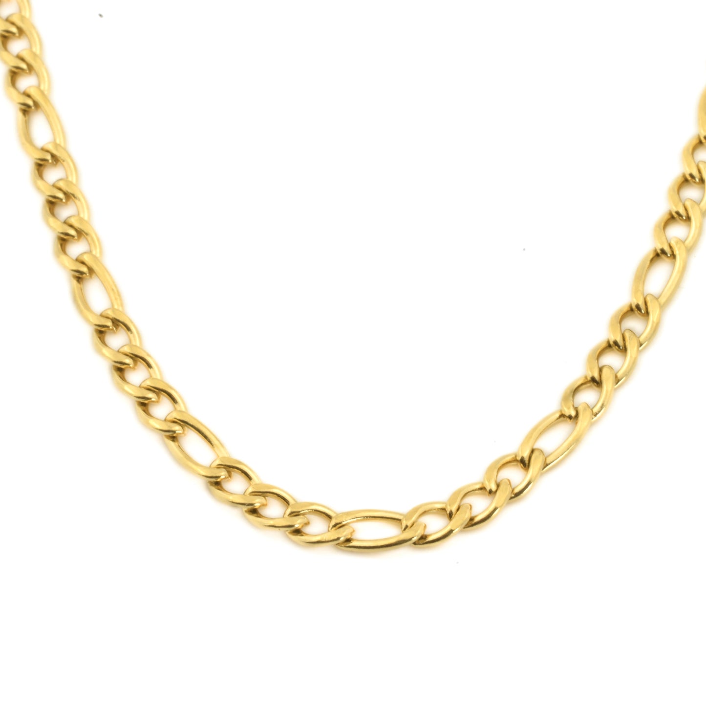 Close up view of gold figaro necklace showing alternating big an small links on a white background