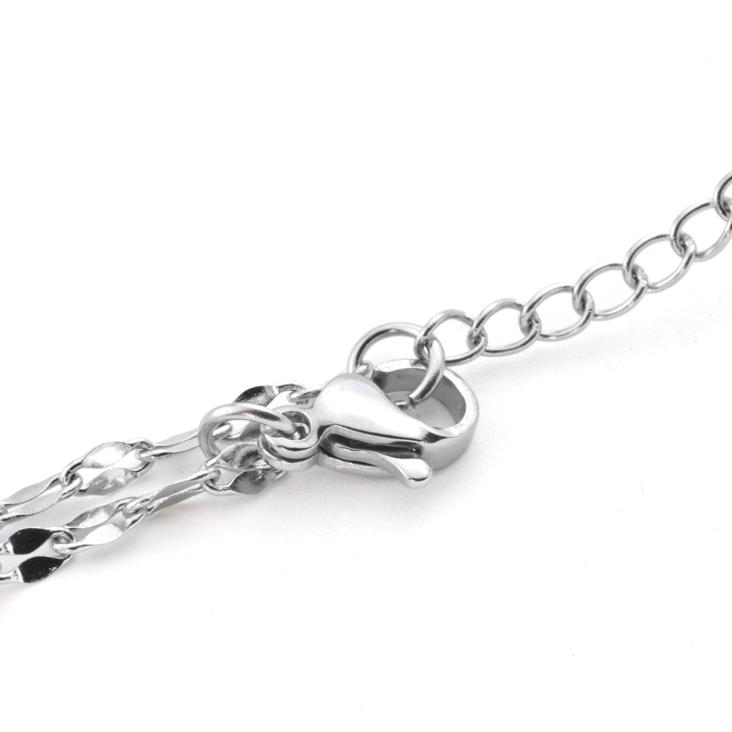 Close-up of the clasp area of silver sequin chain bracelet  showcasing the lobster claw clasp on a white background