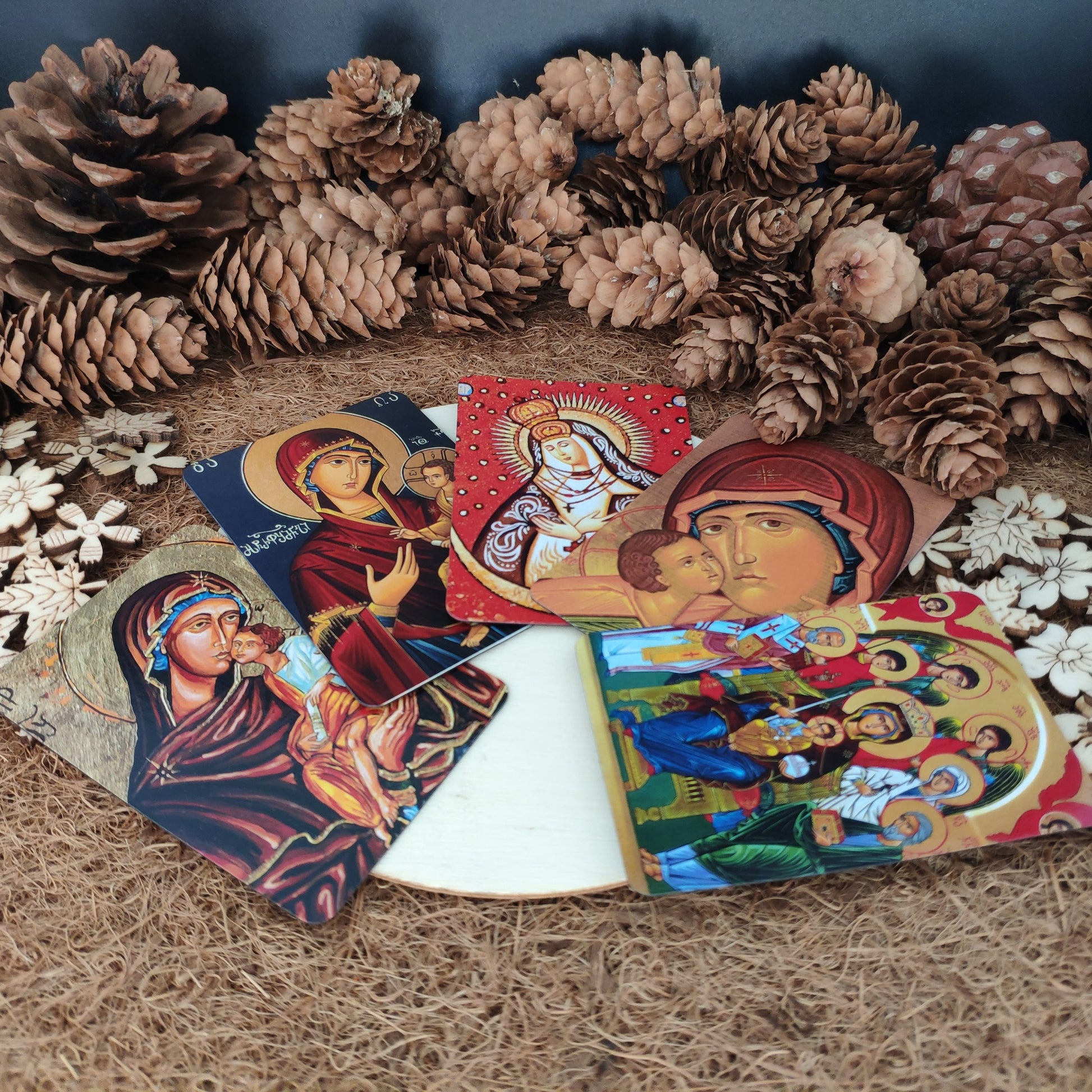 Set of magnets with Orthodox Christian icons on a textured surface