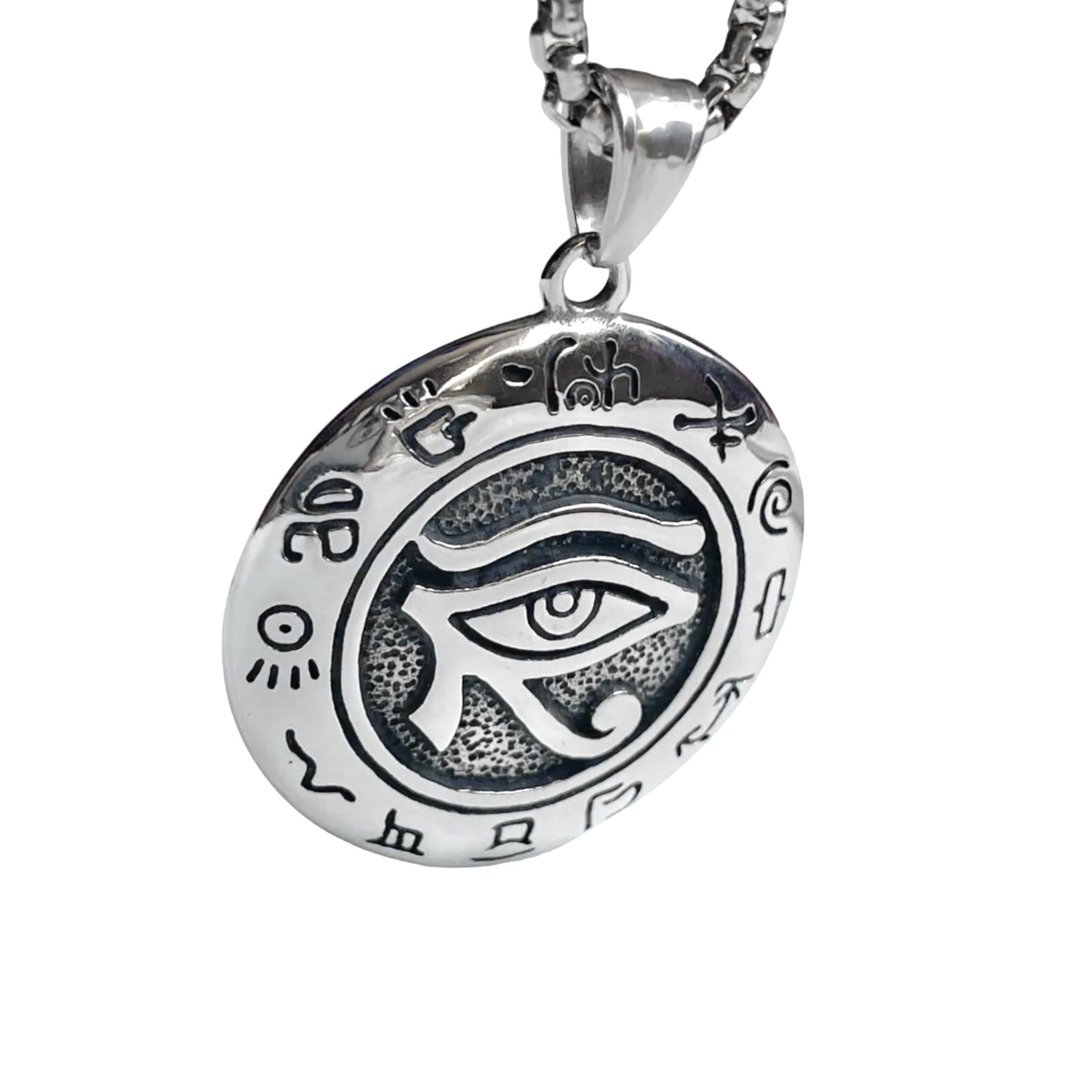 Silver eye of horus pendant with hieroglyphics on a white background