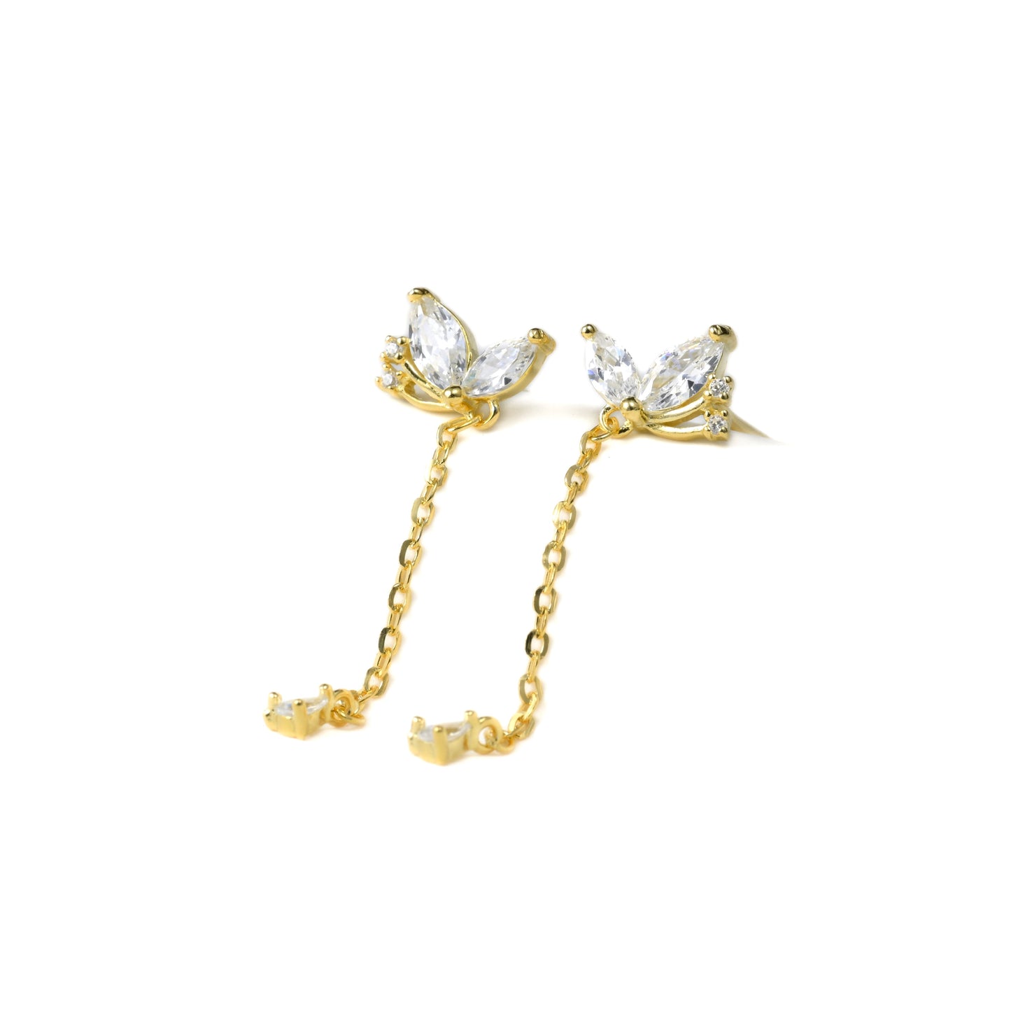 Delicate gold butterfly earrings adorned with marquise-cut CZ and a cable chain drop finished with clear pear-cut cz. 