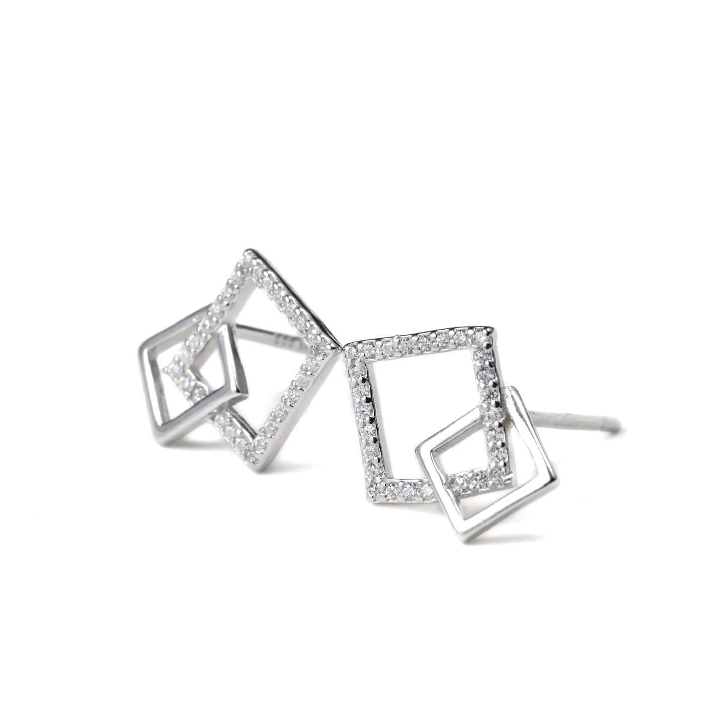 Pair of silver interlocking squareearrings with clear stones on a white background