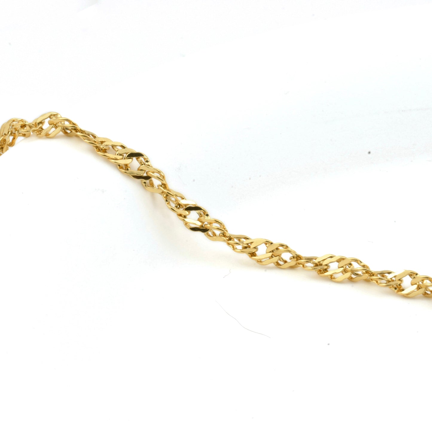 Gold chain on a white background