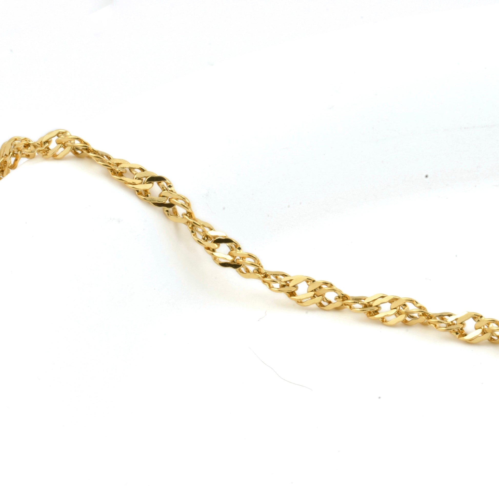 Gold chain on a white background