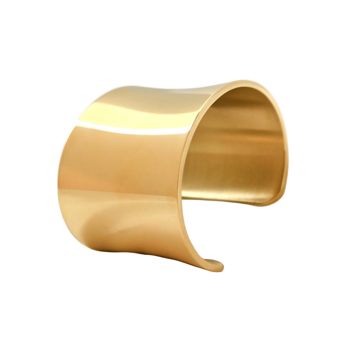 Chunky wide gold cuff bracelet on a pure white background