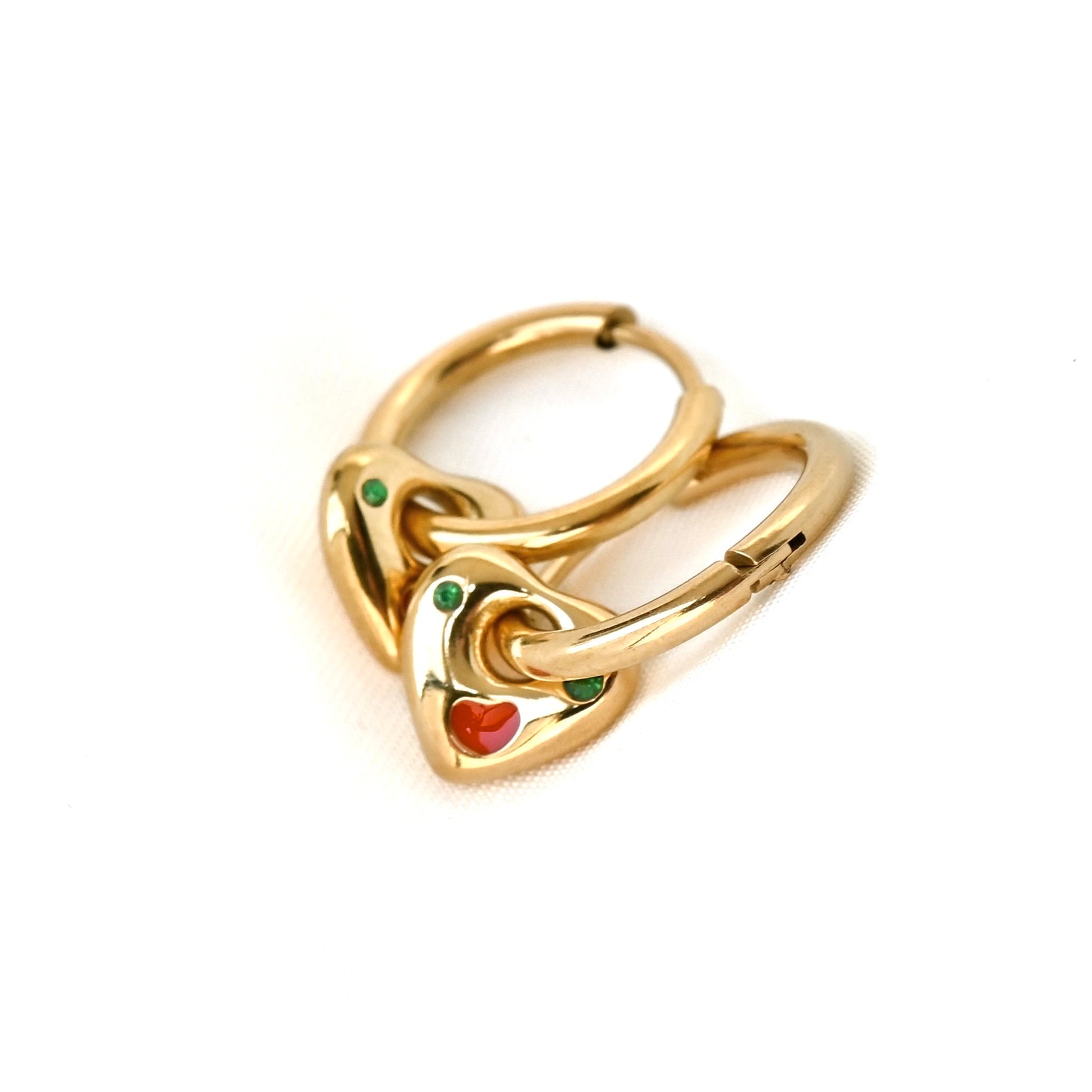 Gold heart hoop earrings with colored stones on a white background