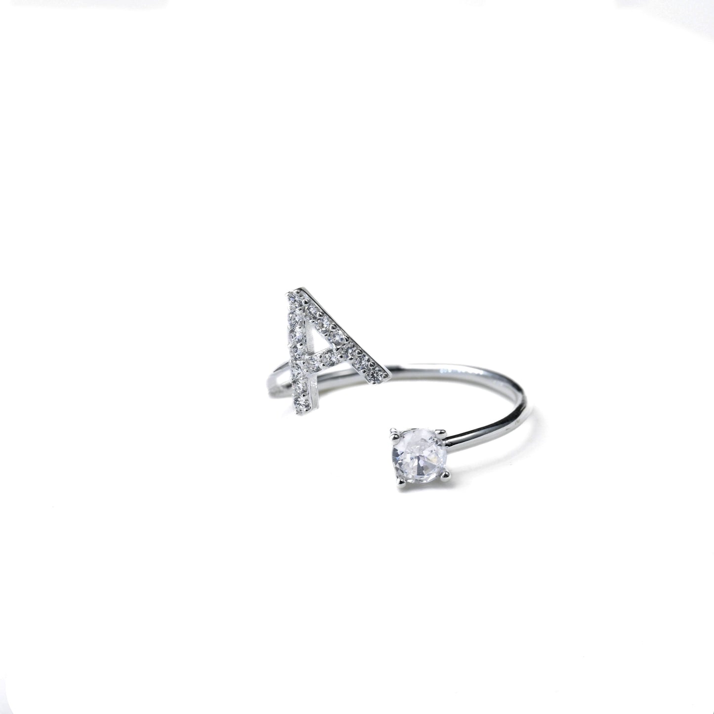Silver initial wing with pave diamond letter and a round CZ