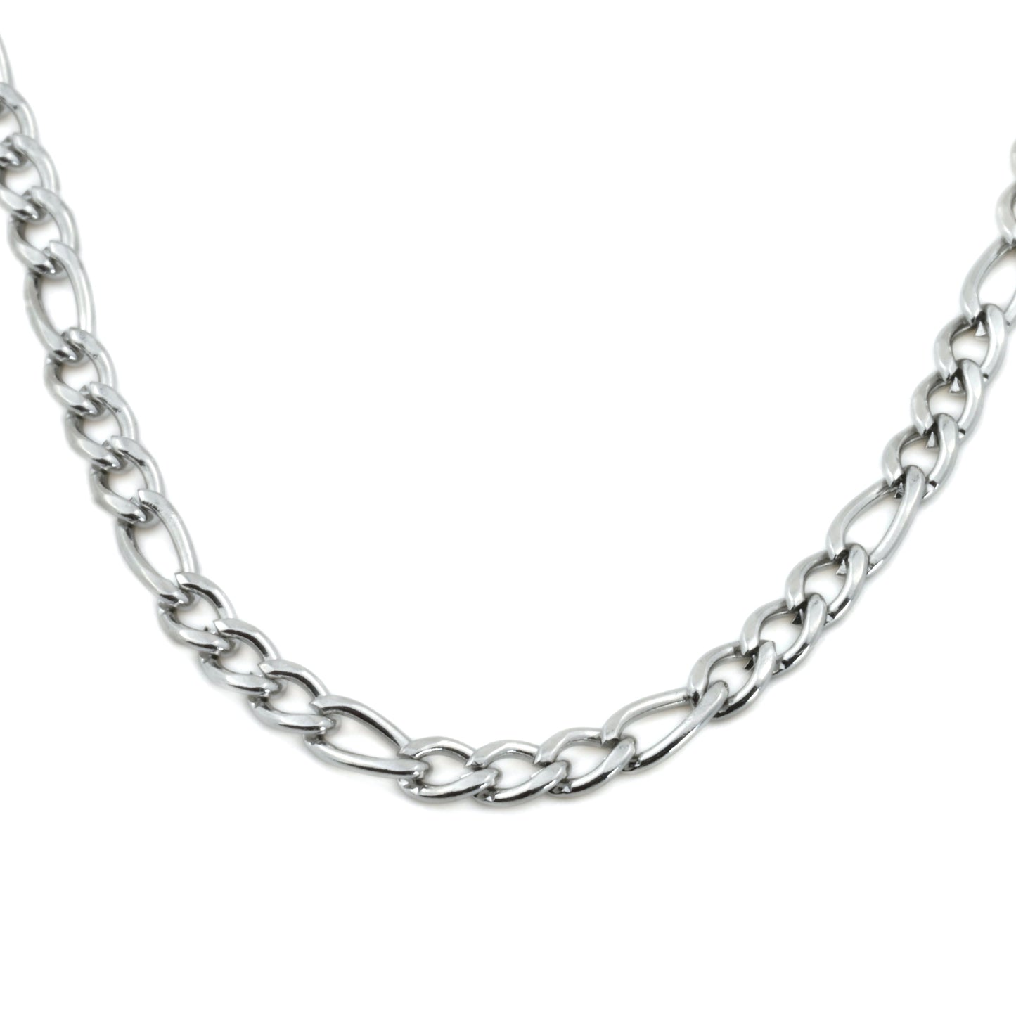 Close up view of silver figaro necklace showing alternating big an small links on a white background