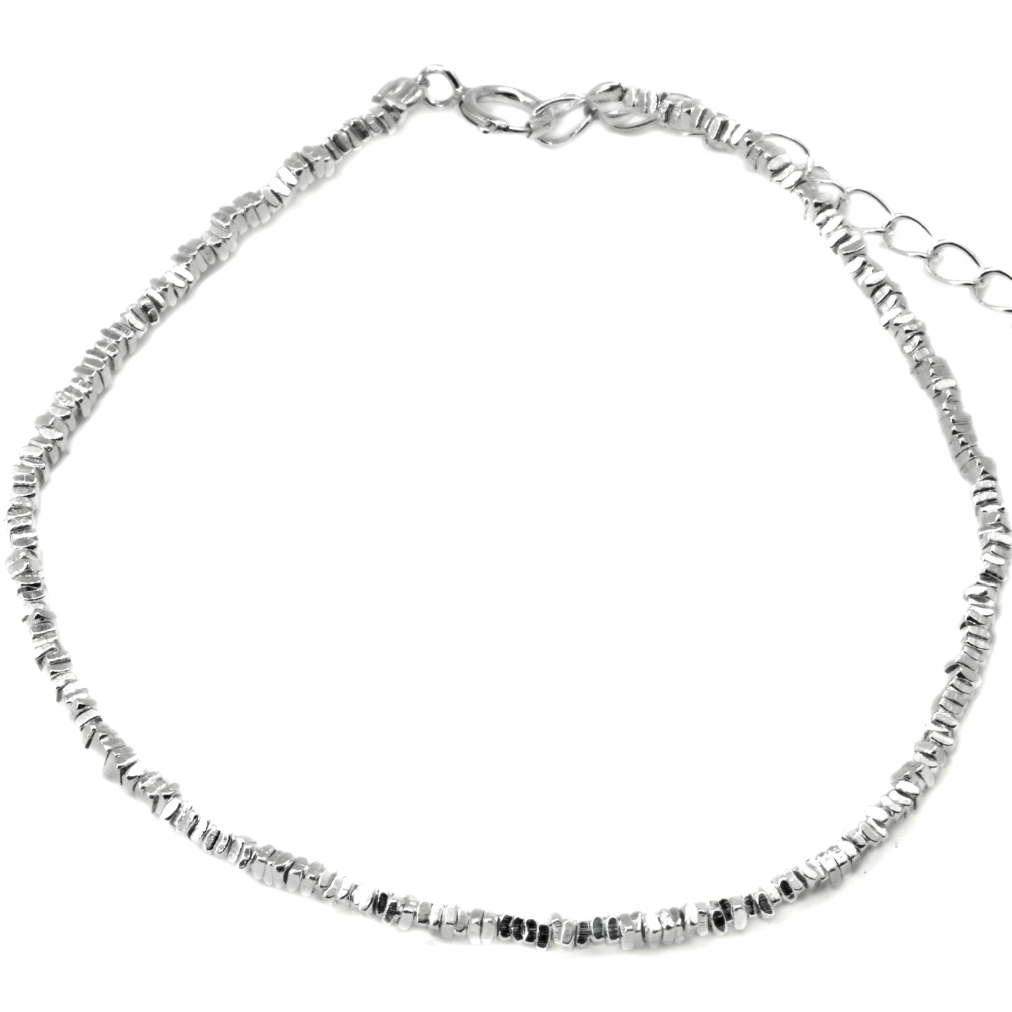 Silver bracelet with small beads, a spring ring clasp and extender on a white background
