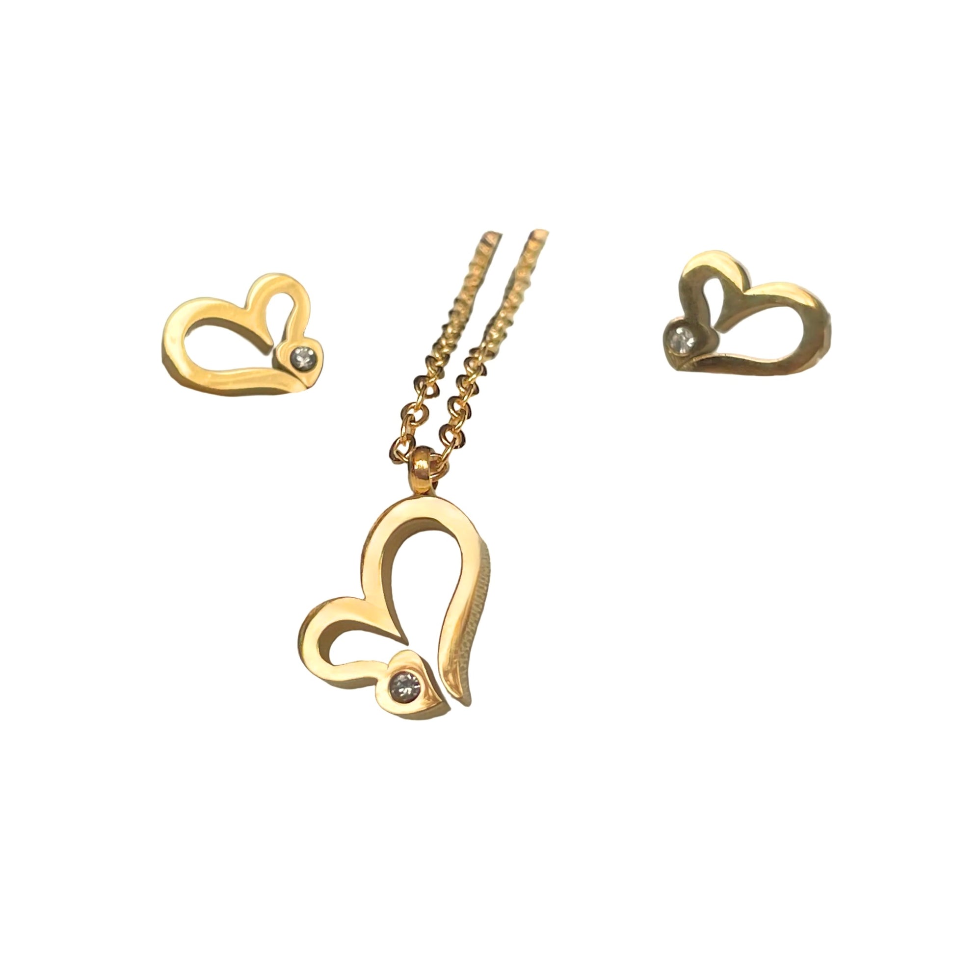 Small gold heart necklace with matching stud earrings on a white background
