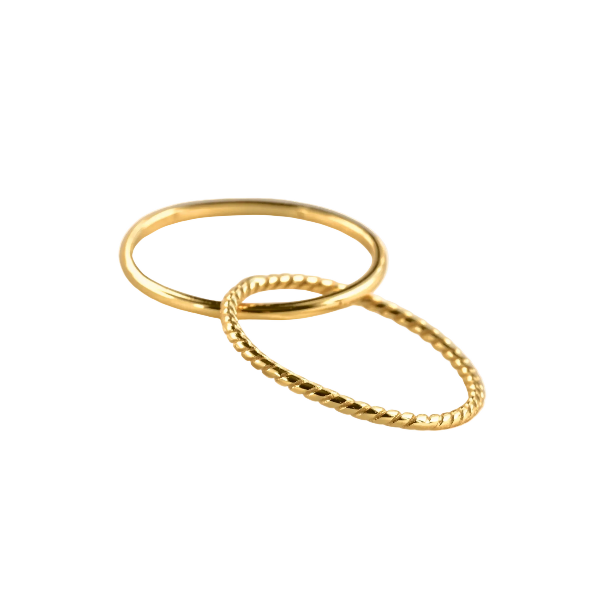Two ultra thin interlocked gold bands, one smooth and one twisted on a white background