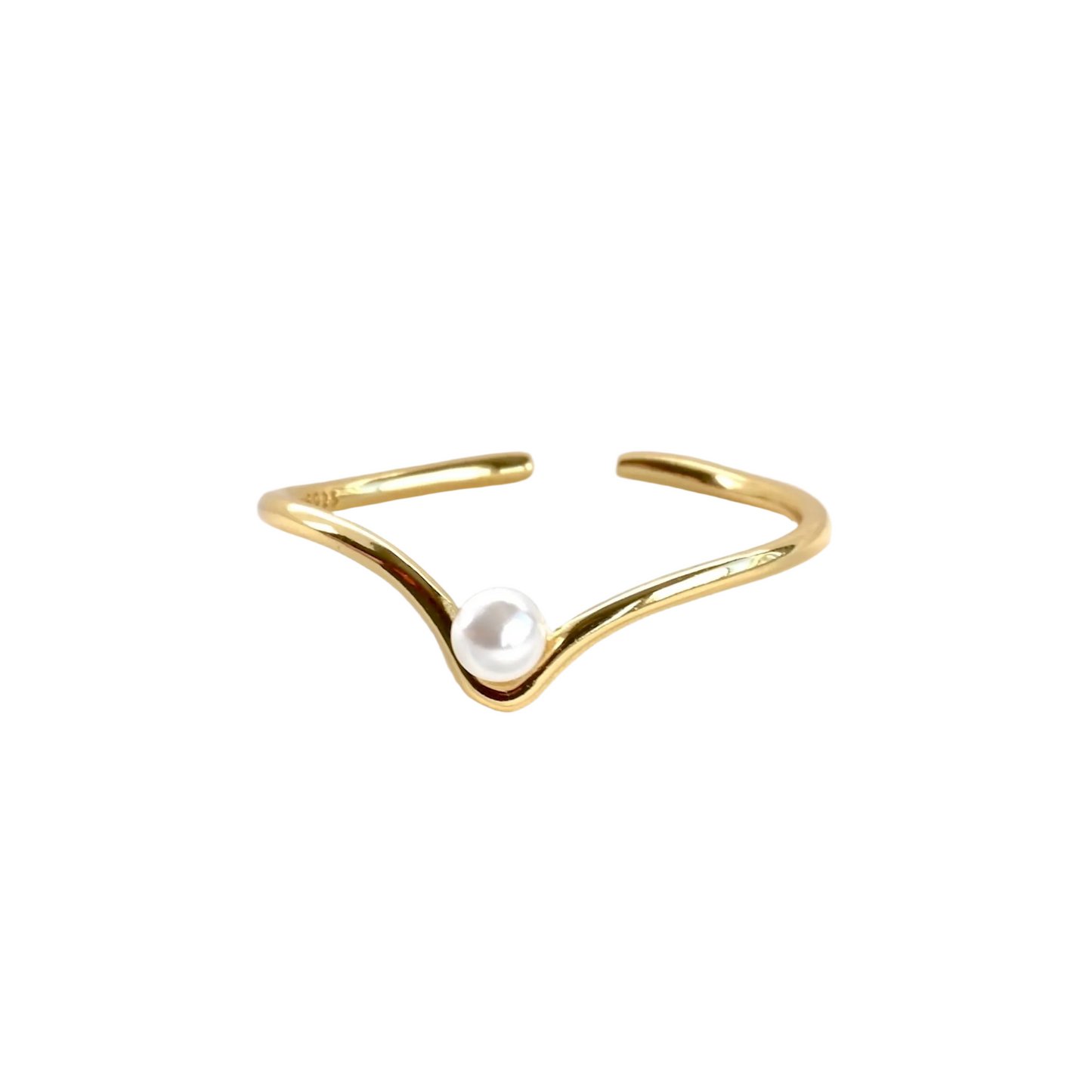Gold ring with a pearl on a white background