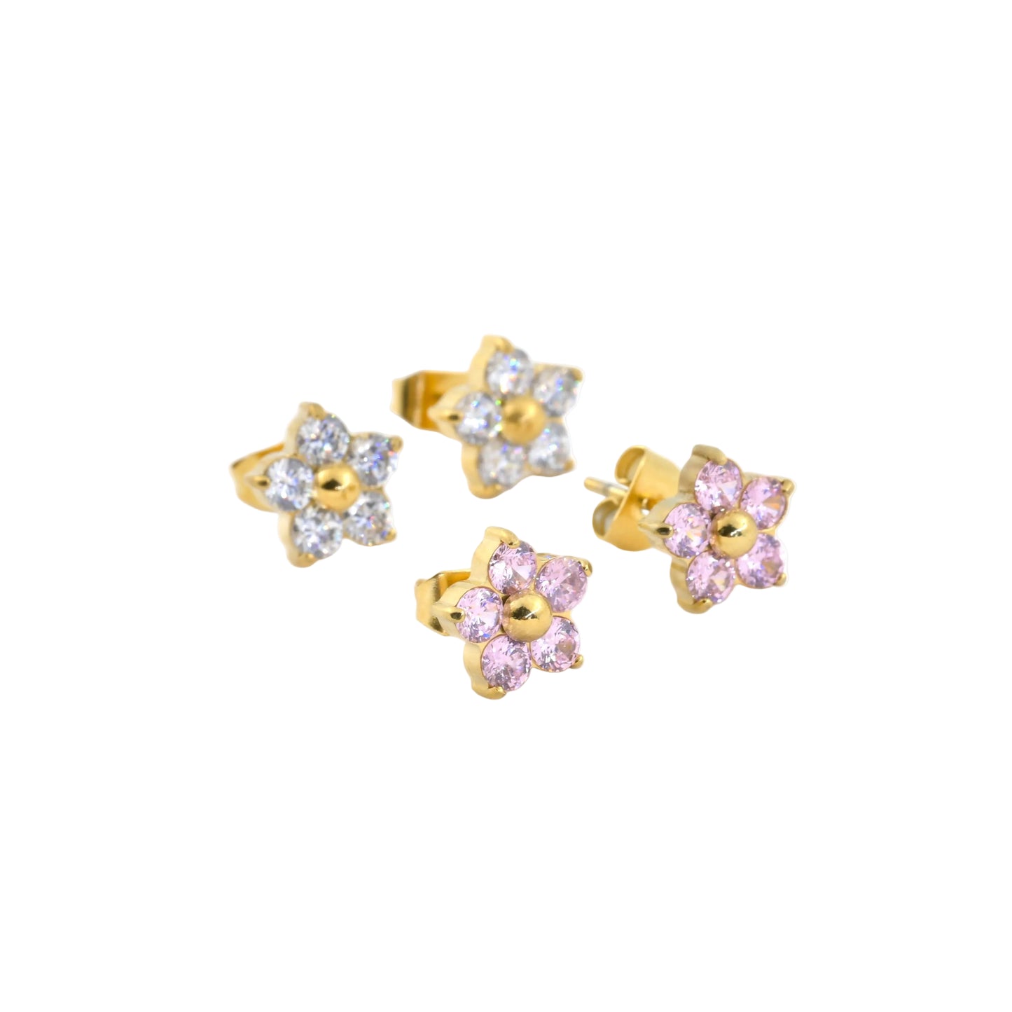 Two pairs of gold and gemstone flower stud earrings on a white background