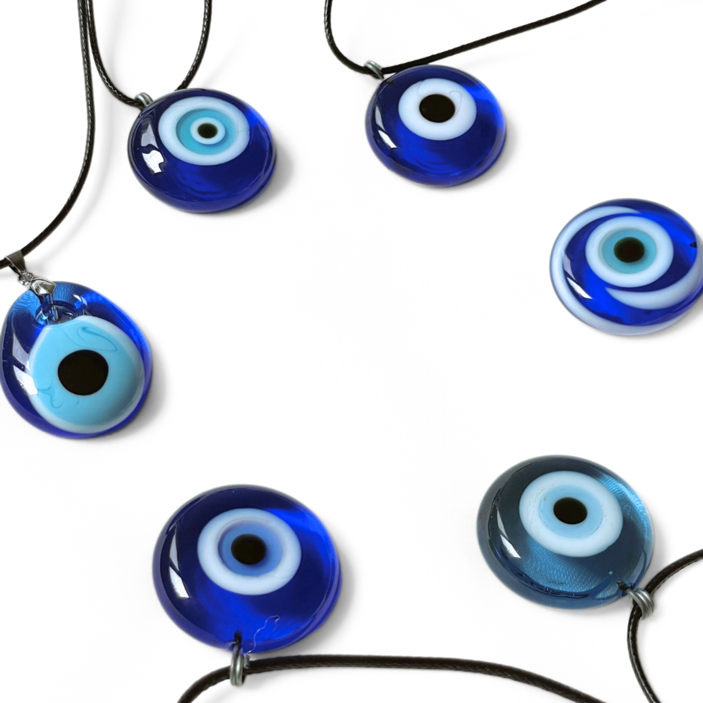 Large 30mm glass evil eye pendants on black rope chains on a white background