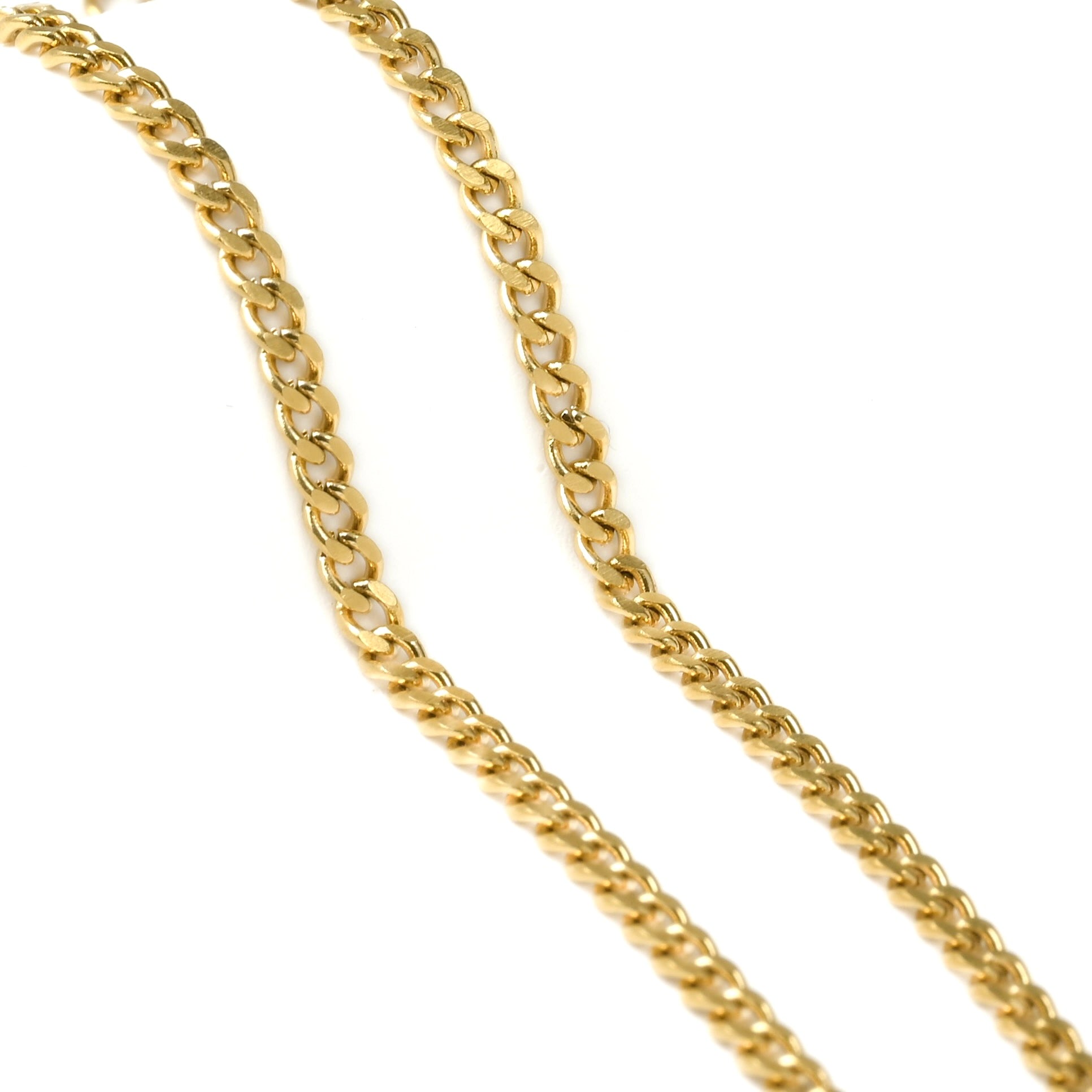 5mm Gold cuban chain on a white background