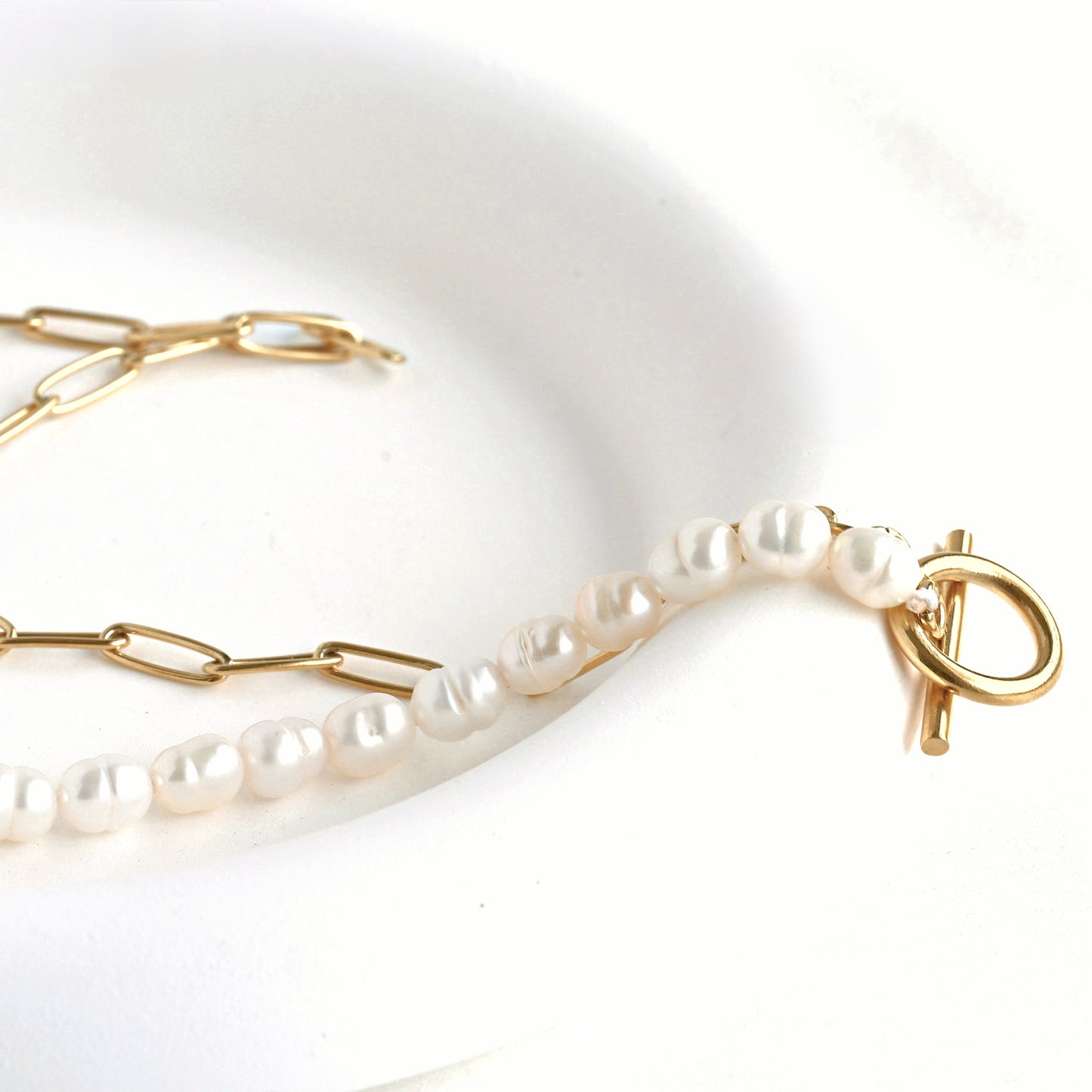 close-up of baroque pearls chain and toggle clasp