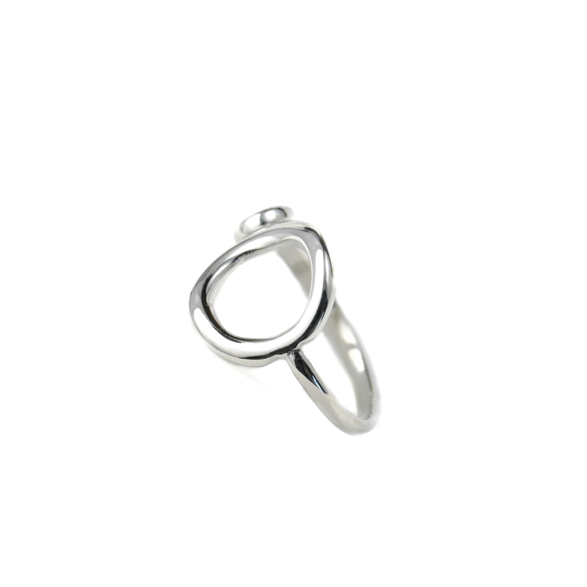 Silver ring with a circle-shaped open design on a white background