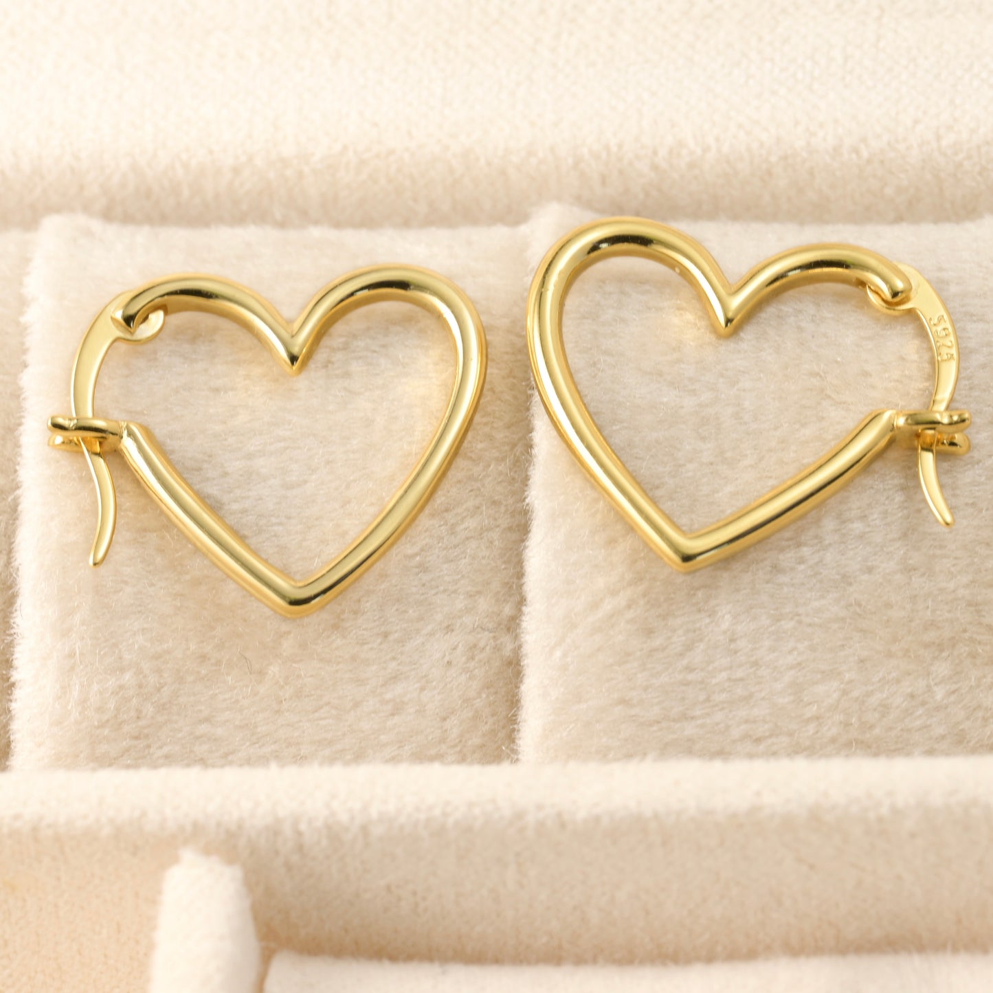 Thin silver heart hoops with s925 stamp on clasp
