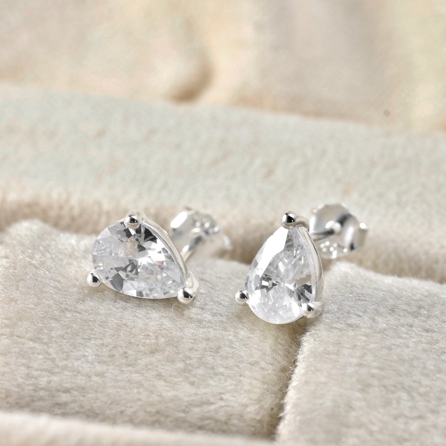 front view of silver stud earrings