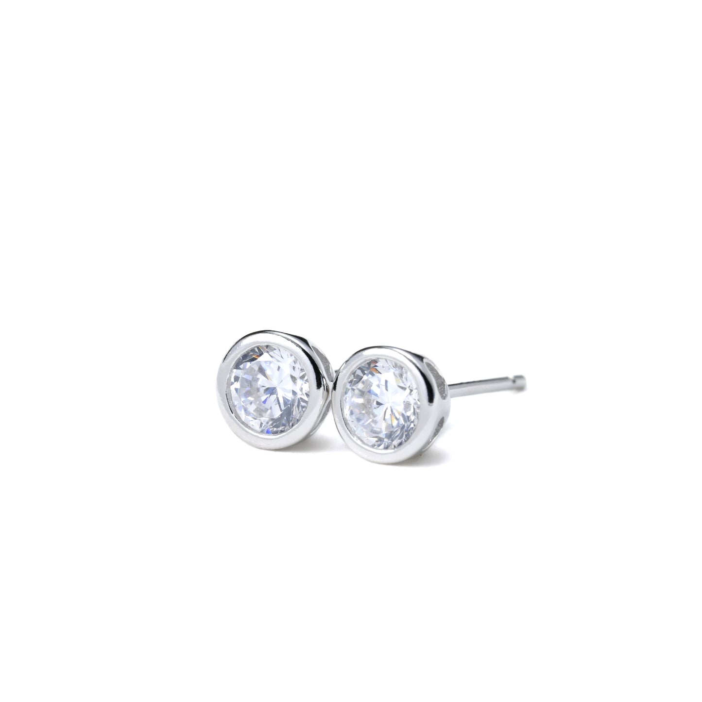 front view of silver circle stud earrings with clear CZ on a white background