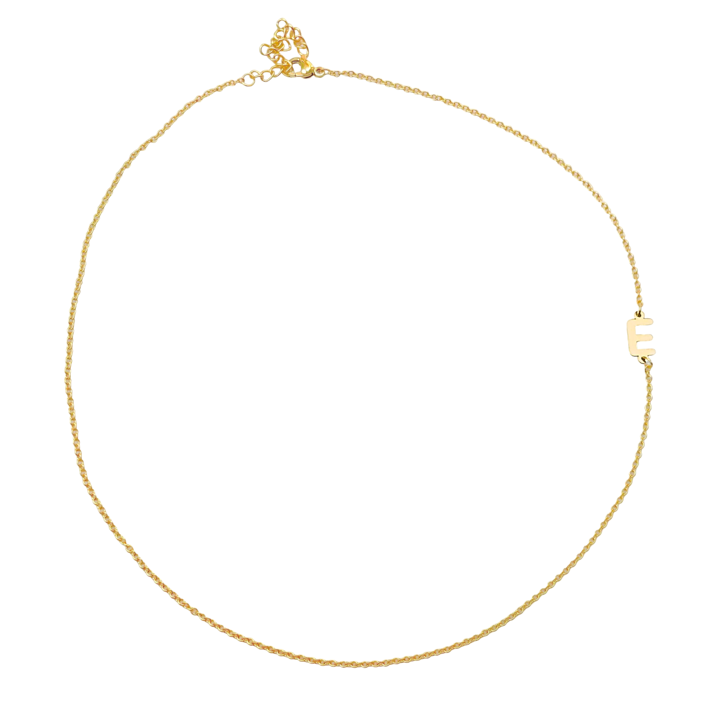 Gold letter necklace on a white background