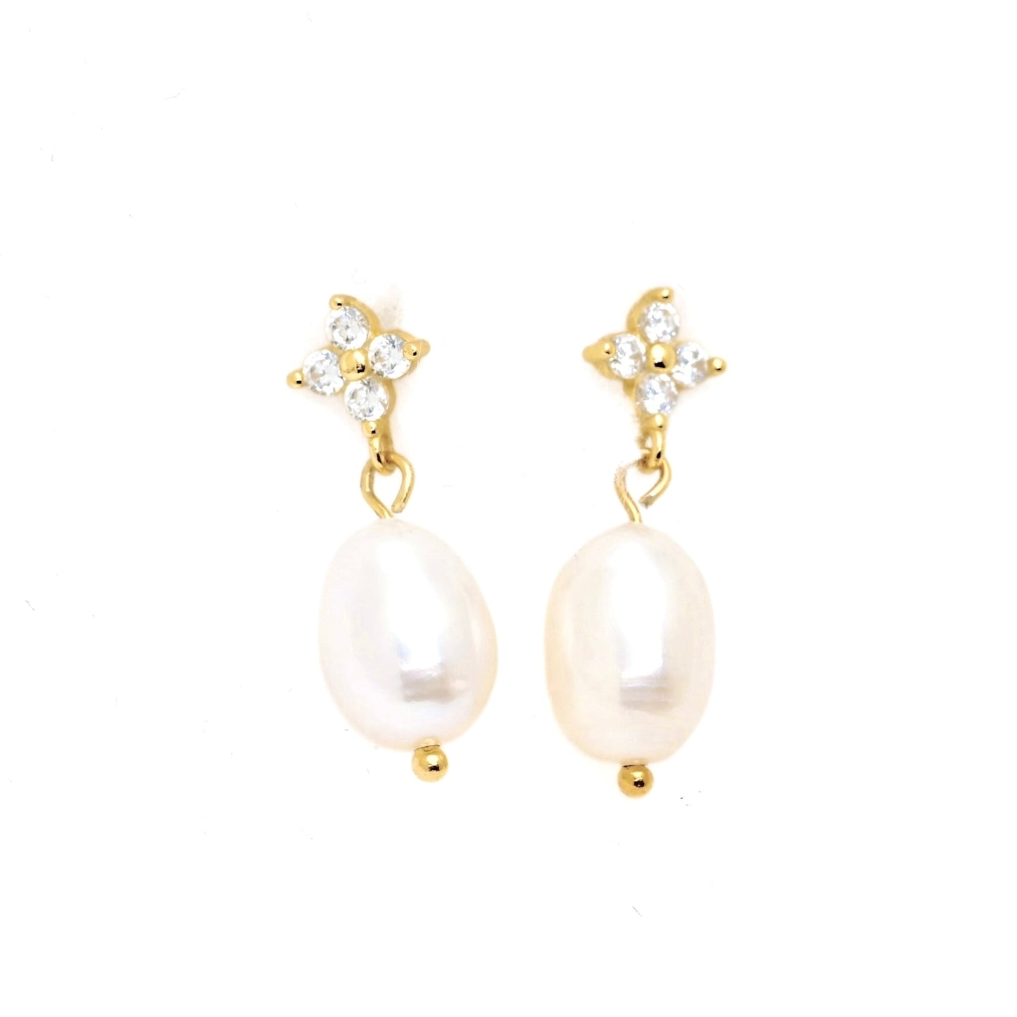 A pair of gold drop earrings featuring a small cluster of clear cubic zirconia stones at the top and a large, lustrous oval freshwater pearl dangling below, set against a plain white background.