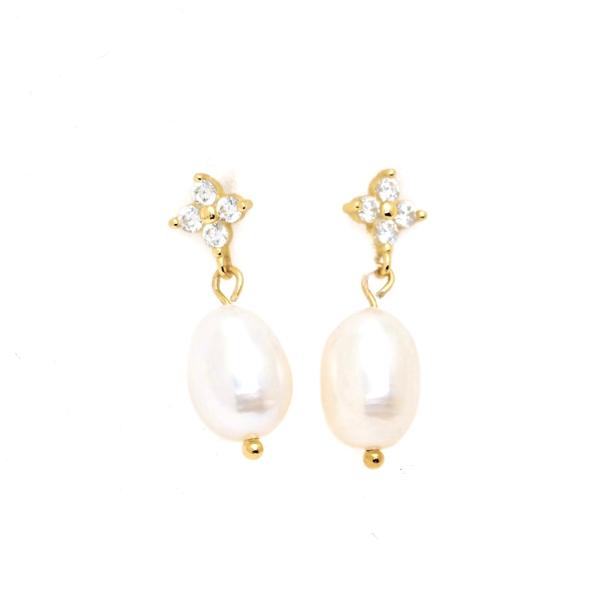 A pair of gold drop earrings featuring a small cluster of clear cubic zirconia stones at the top and a large, lustrous oval freshwater pearl dangling below, set against a plain white background.