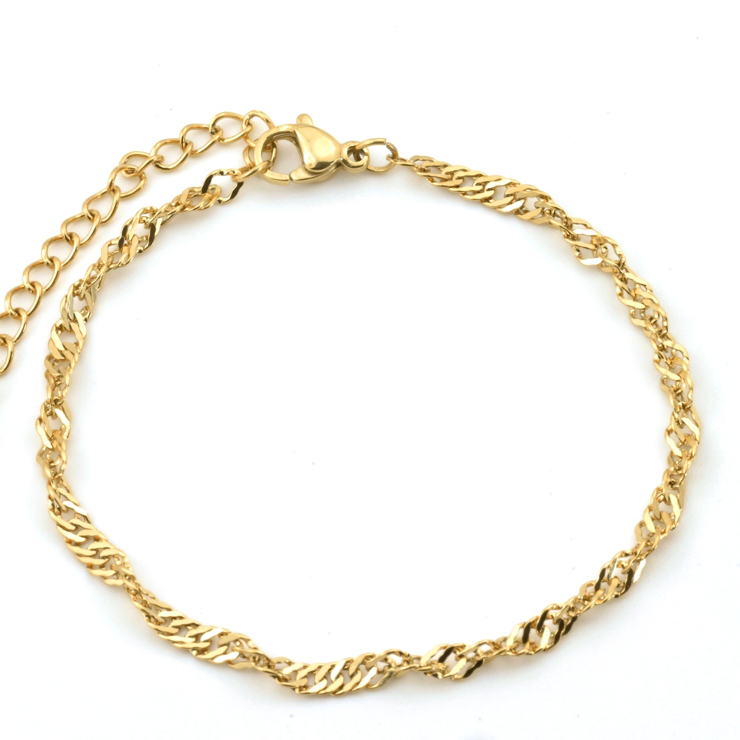 Gold singapore chain bracelet on a white background