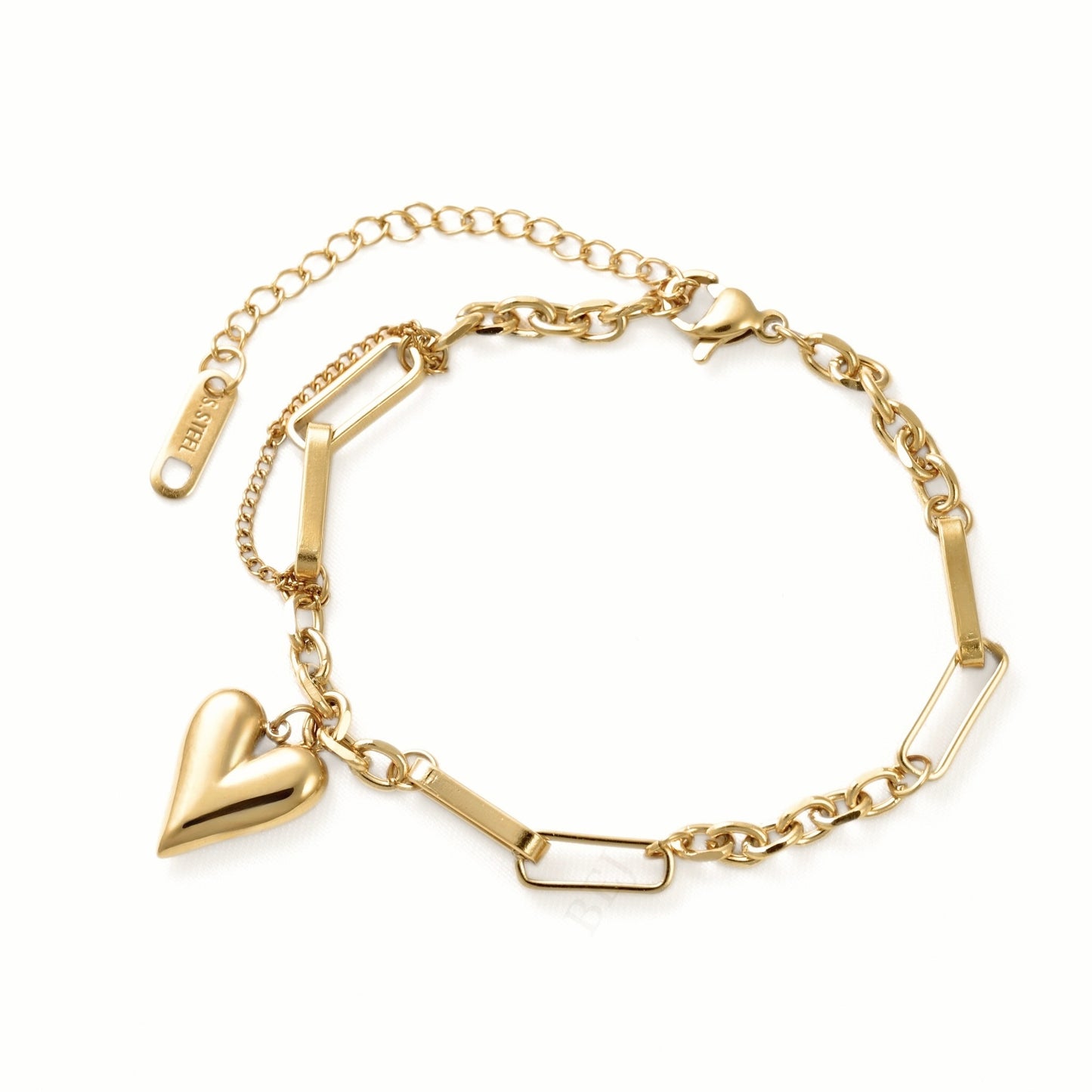 A gold-plated chain bracelet featuring a polished heart charm, rectangular bar links, and an extender chain with a lobster clasp, shown on a plain white background.