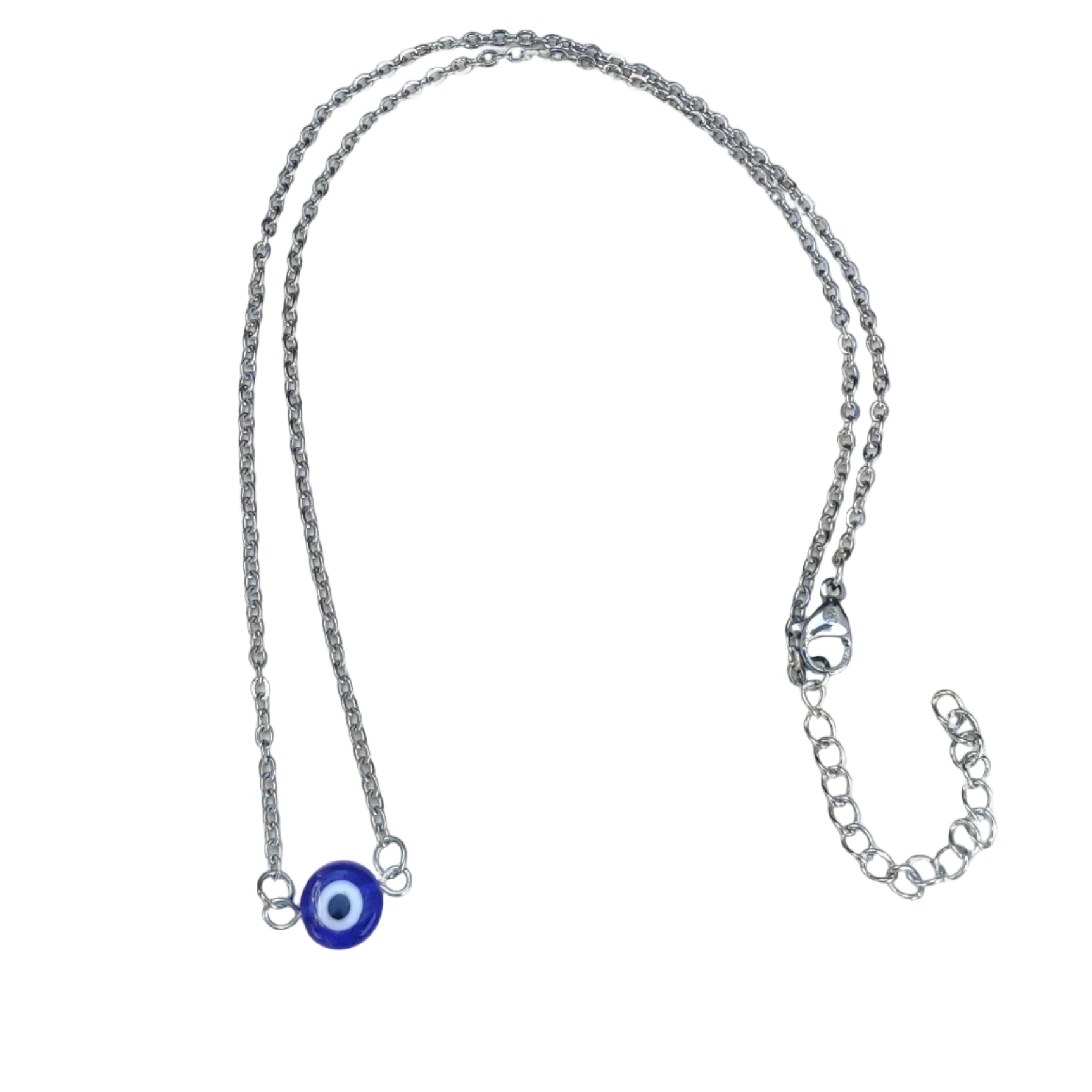 Silver Necklace with a  plastic round blue evil eye charm on a white plate