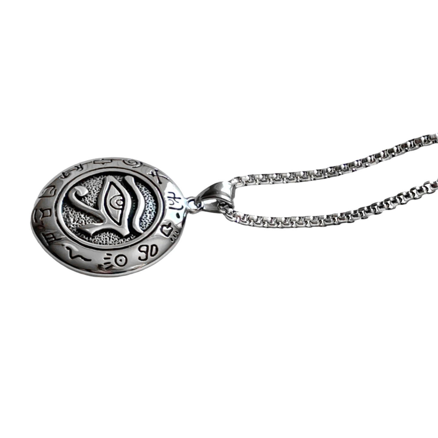 Side view of ancient Egyptian inspired silver necklace on a white background