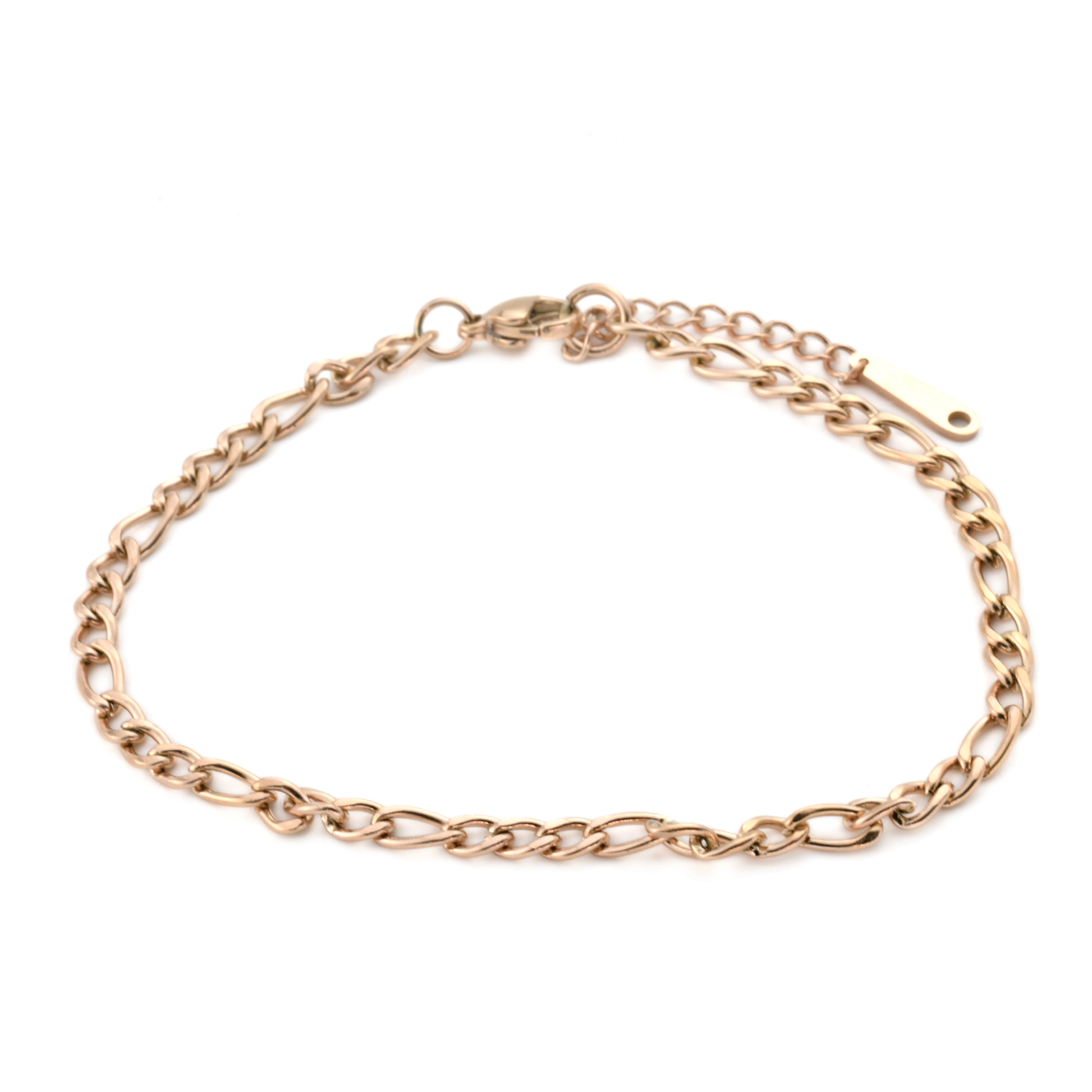 Rose gold chain ankle bracelet on a white background