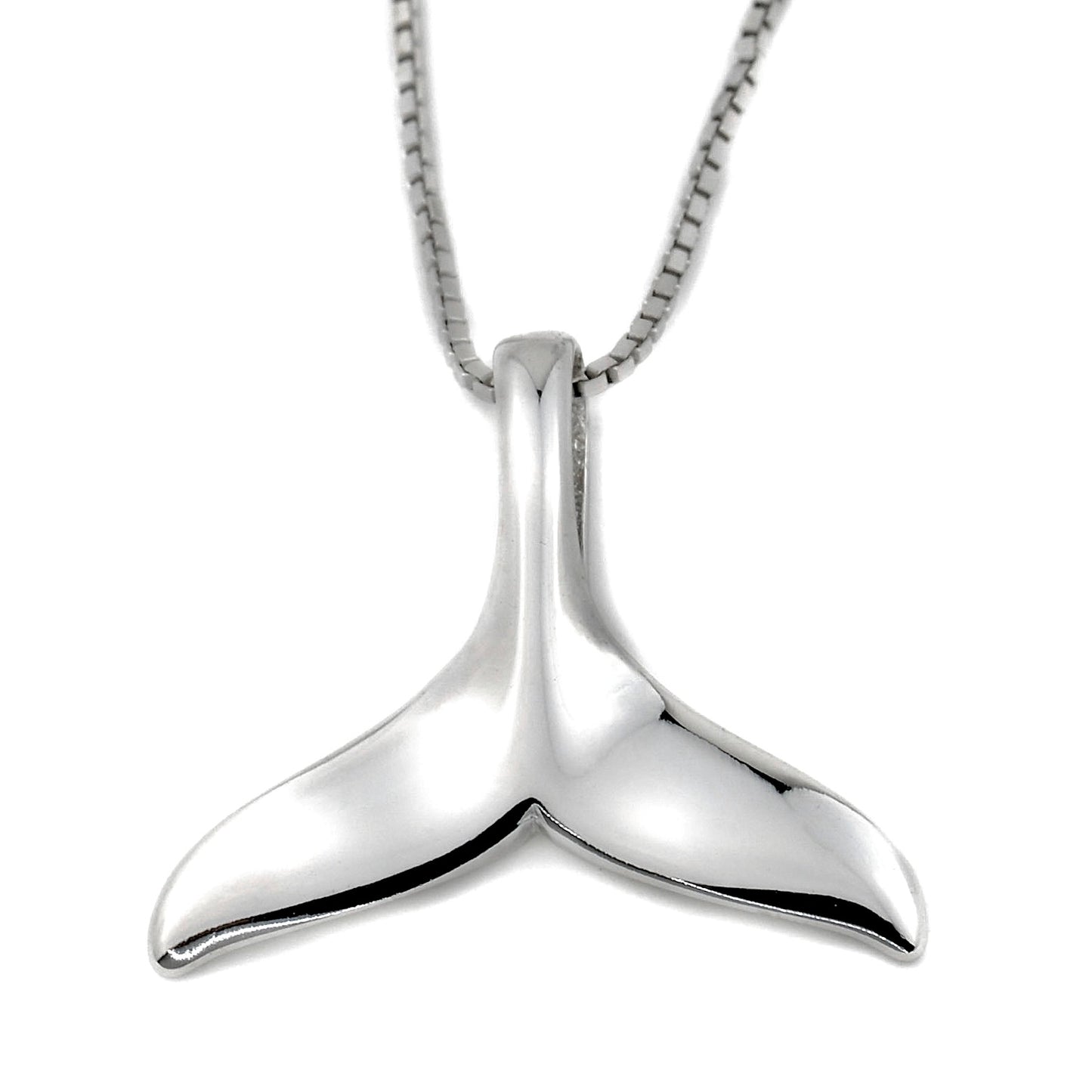Top view of silver mermaid pendant on a white background