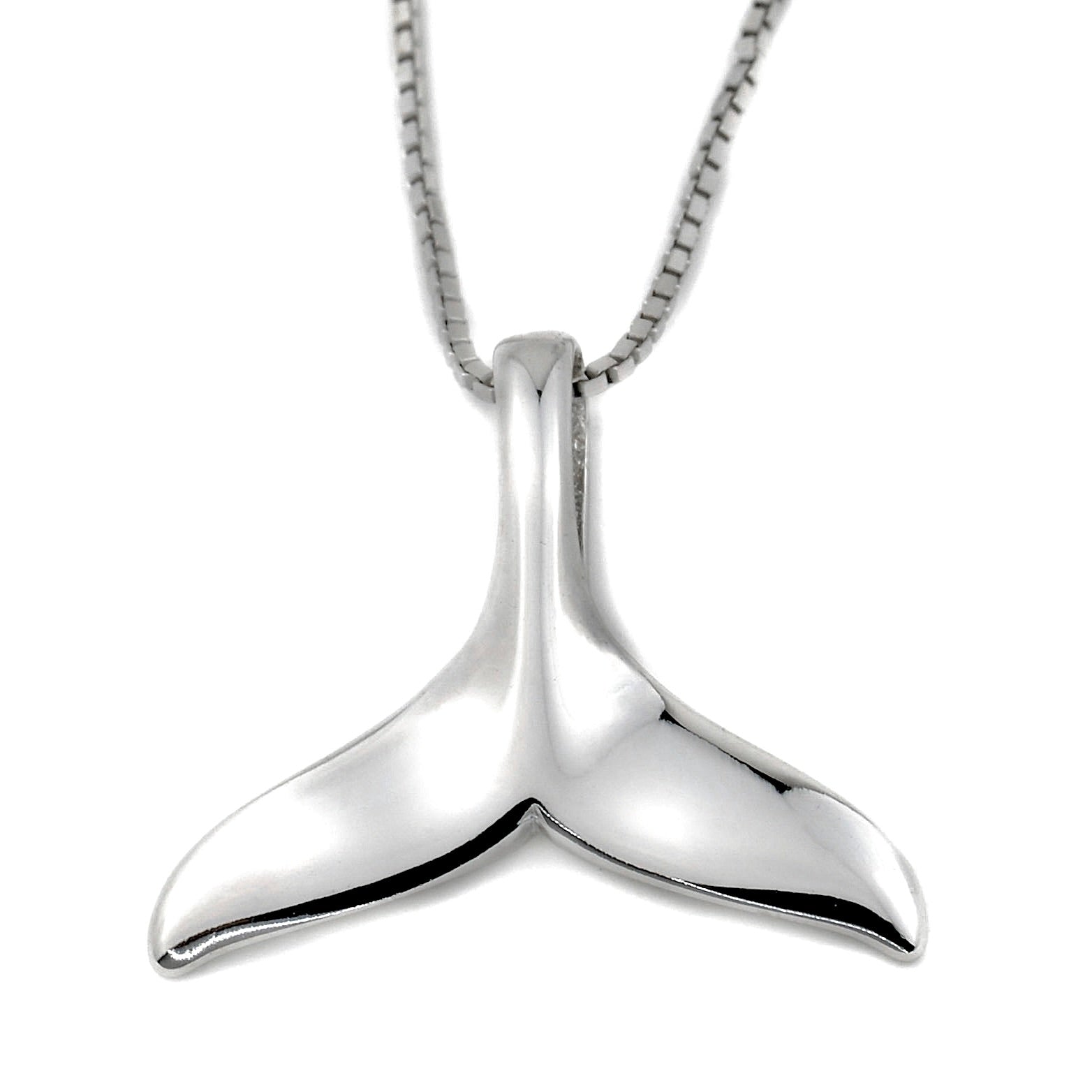 Top view of silver mermaid pendant on a white background