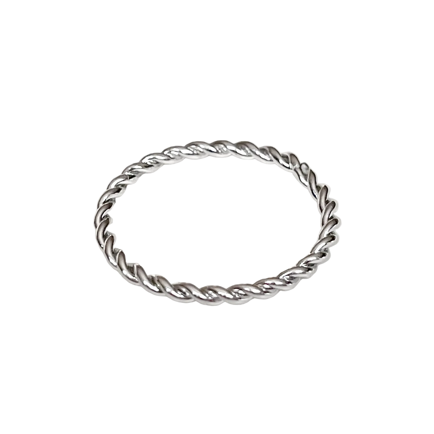 Silver twisted ring on a white background